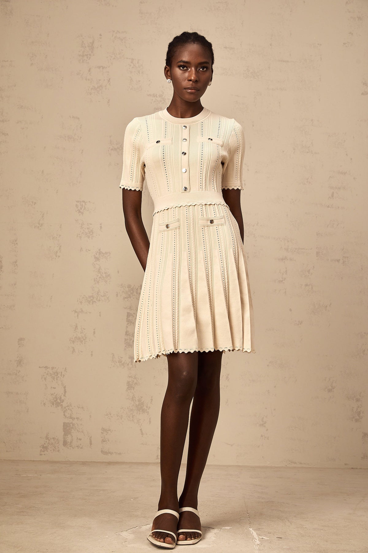 Amélie neutrals pointelle-trim pleated knit mini dress (Final Sale-US Only)