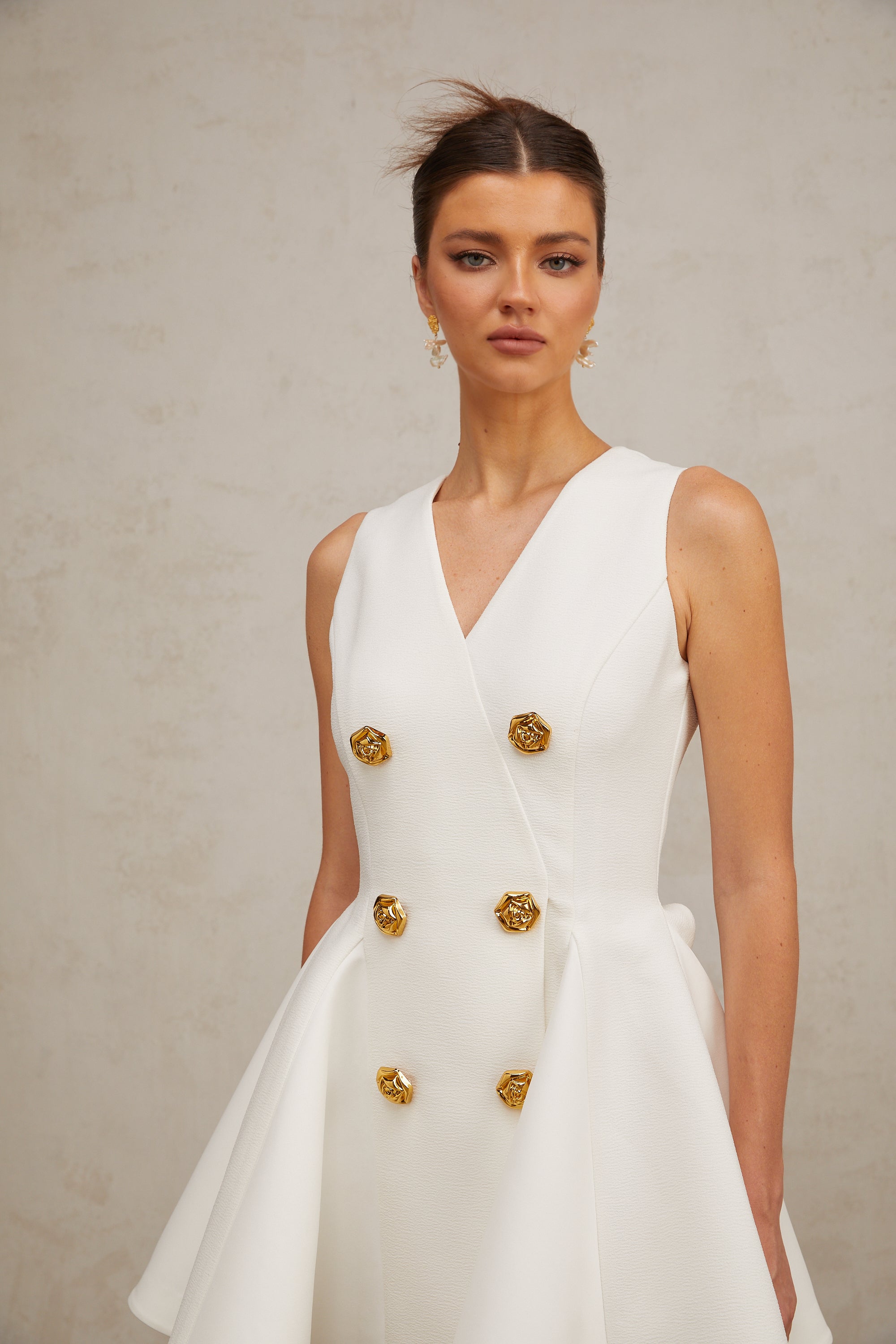 Élise pleated peplum-hem sleeveless mini dress