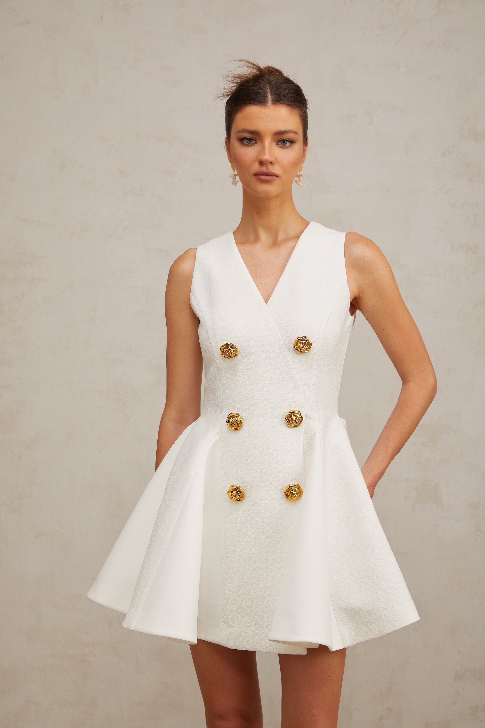 Élise pleated peplum-hem sleeveless mini dress