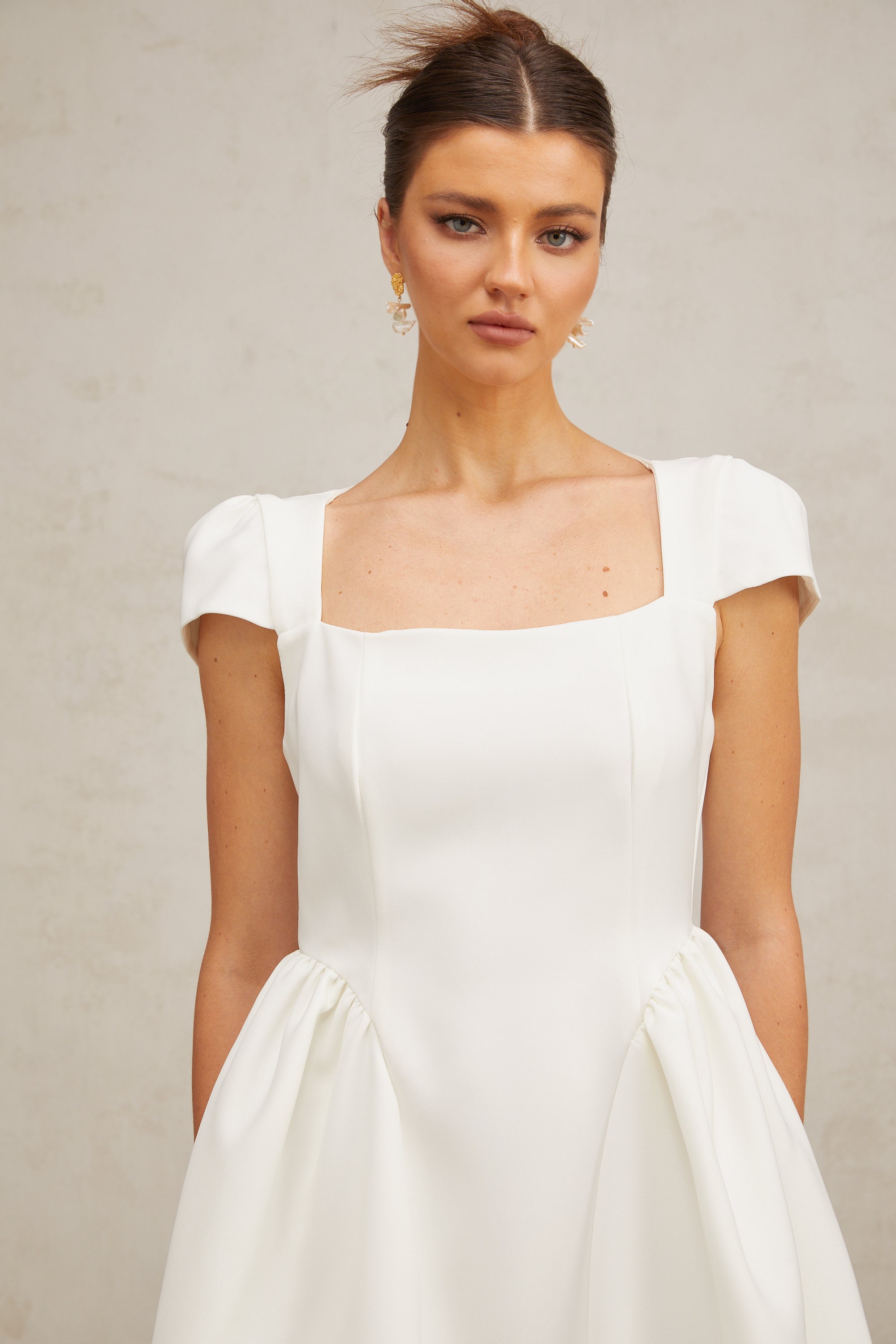 Raphaëla white cap-sleeve mini dress