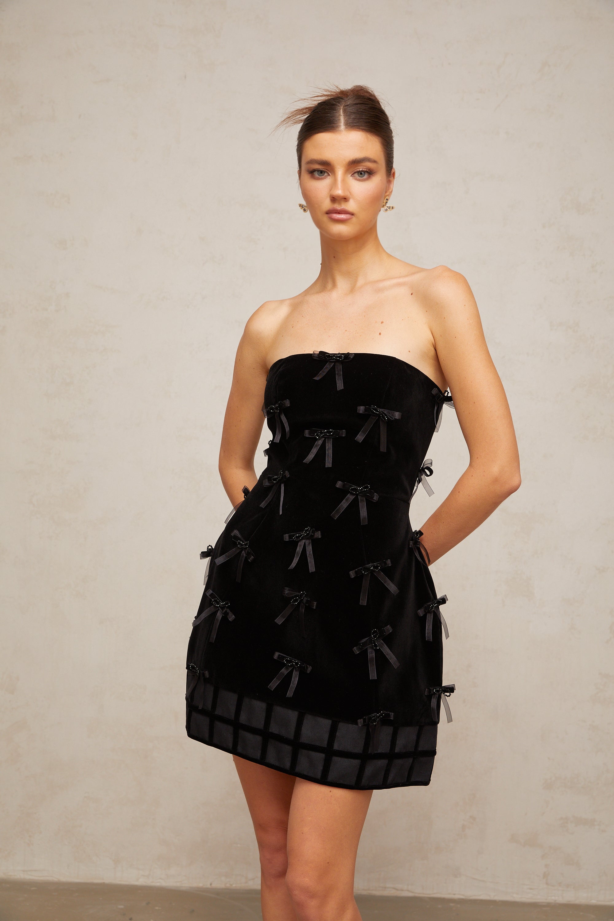 Geneviève black bow-detail mini dress