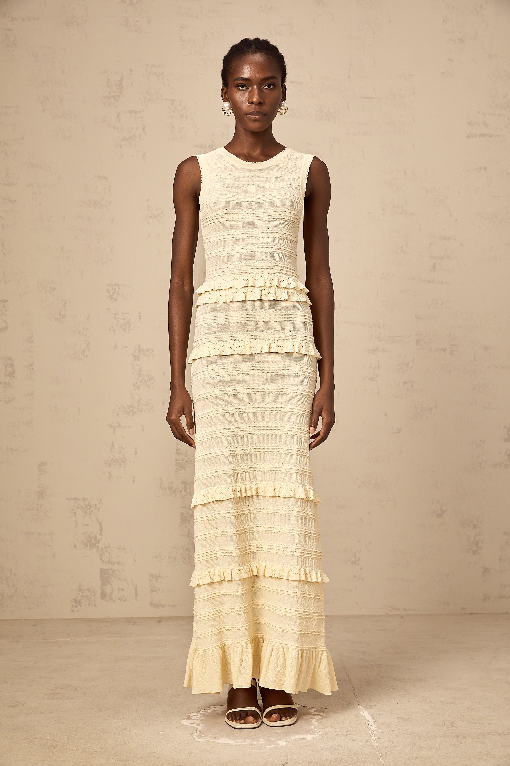 Airelle beige ruffled sleeveless knit maxi dress