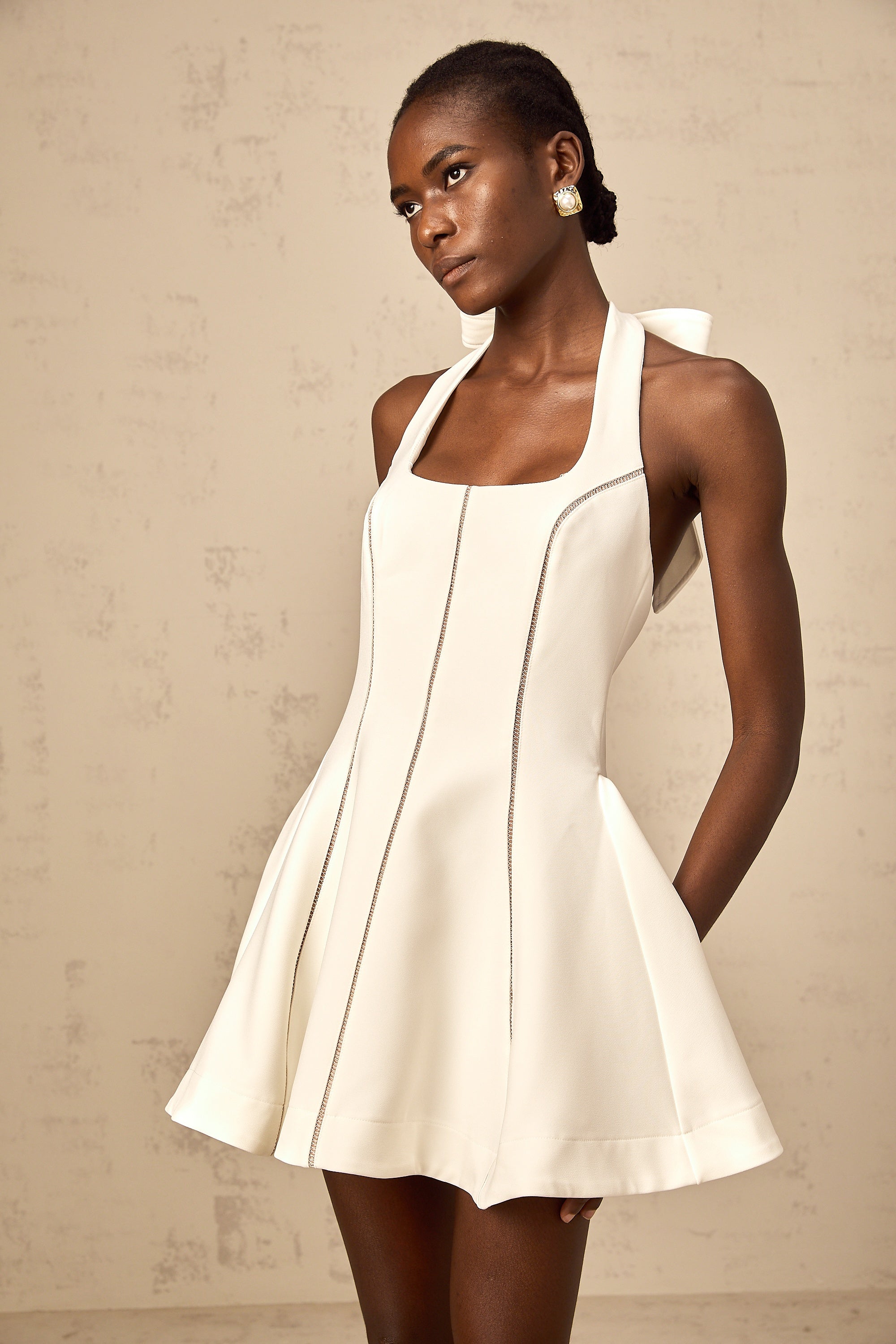 Quirine halterneck bow-detail mini dress in White (Final Sale)