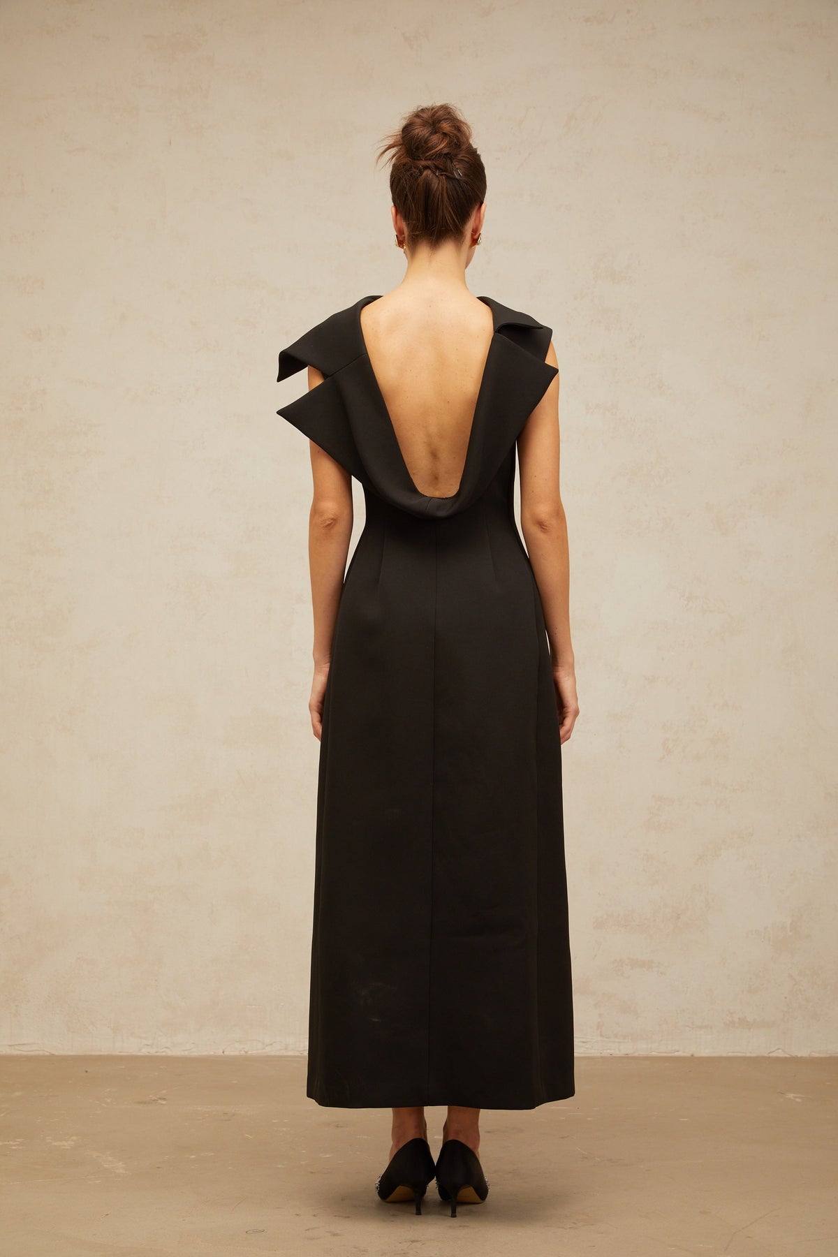 Léonore black deconstructed open-back midi dress