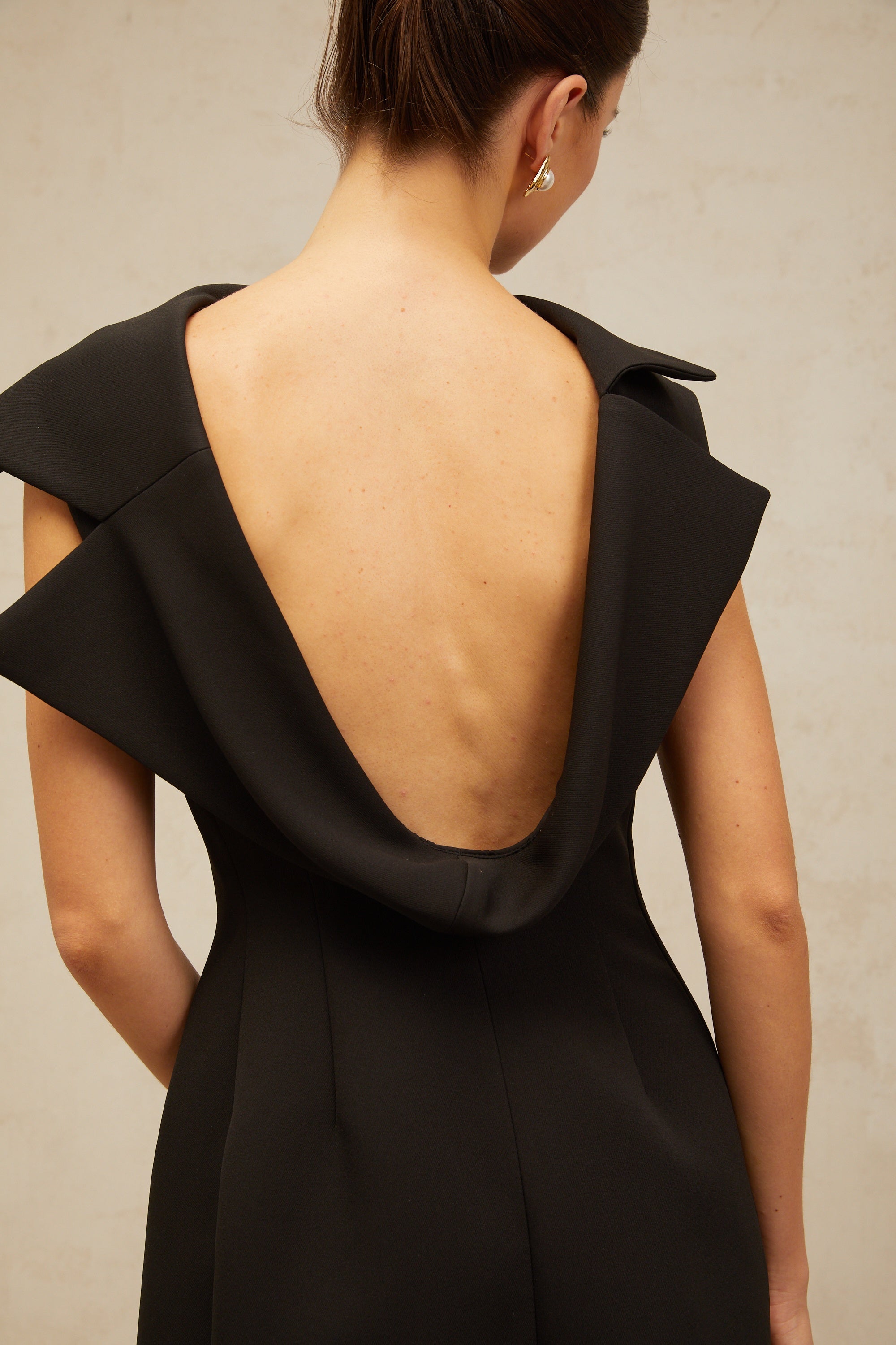 Léonore black deconstructed open-back midi dress