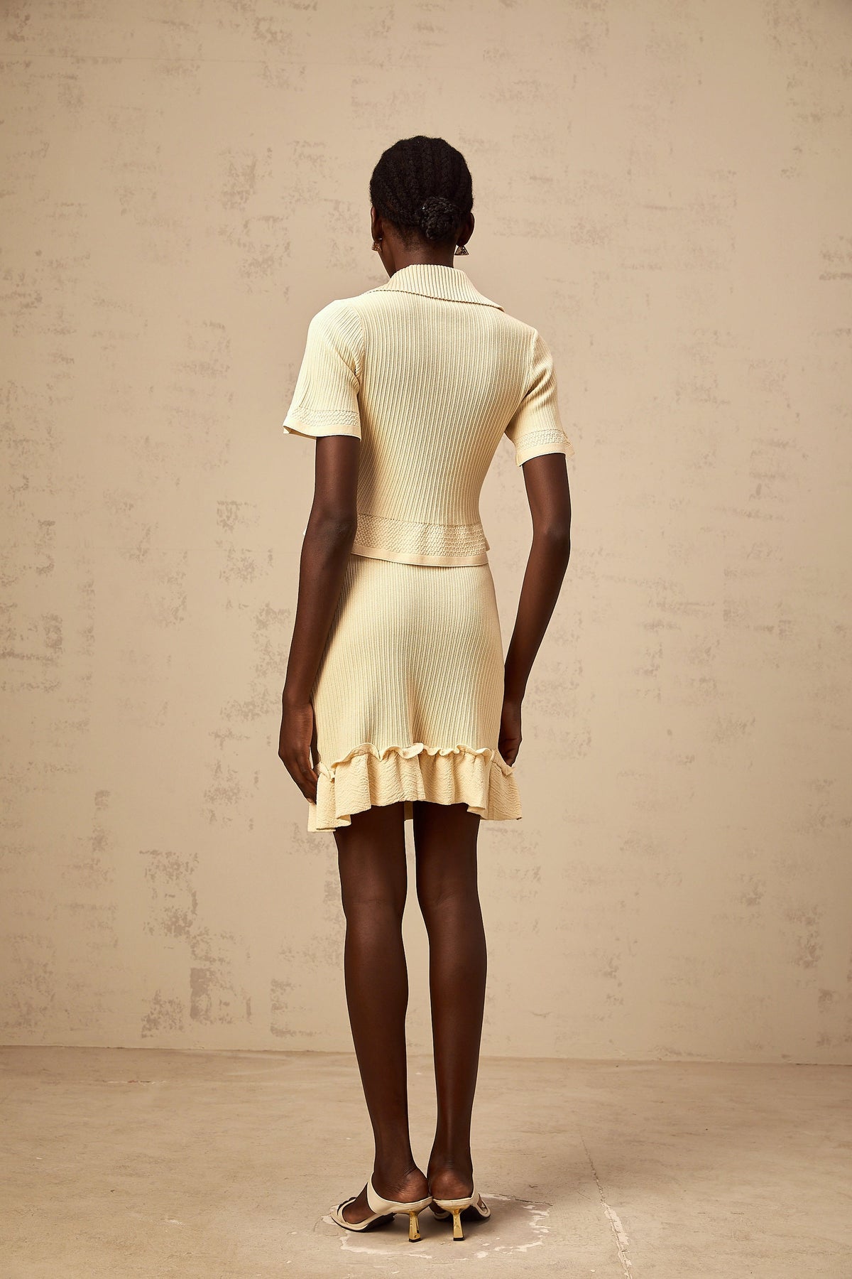 Reine yellow ruffled ribbed-knit top & skirt matching set
