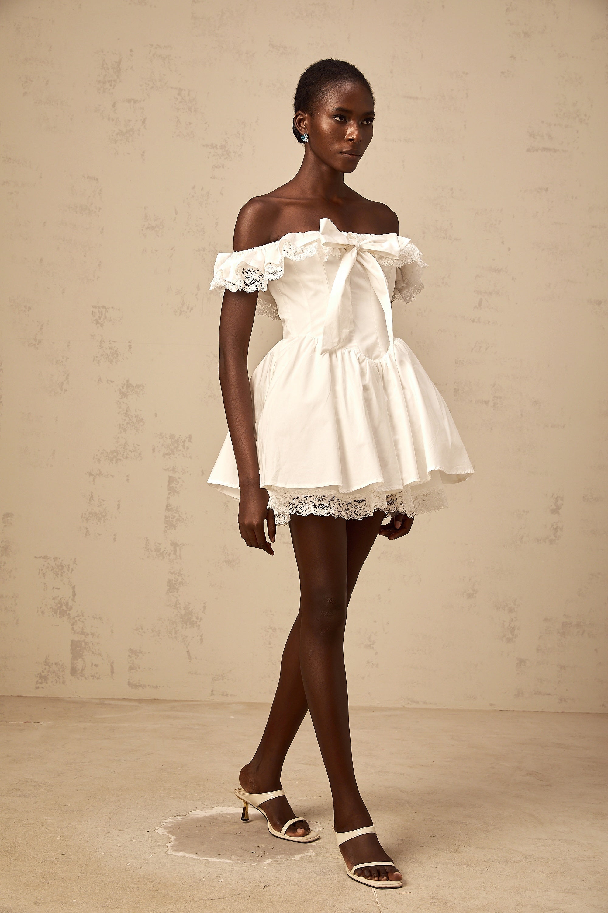 Arsène white oversize-bow ruffled mini dress