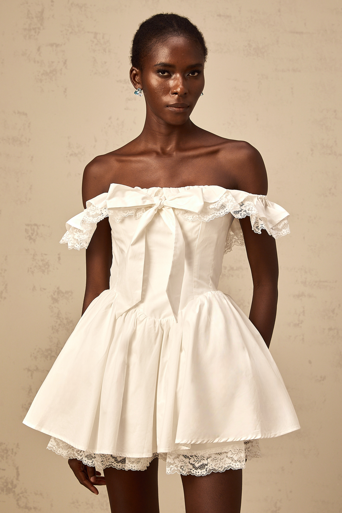 Arsène white oversize-bow ruffled mini dress