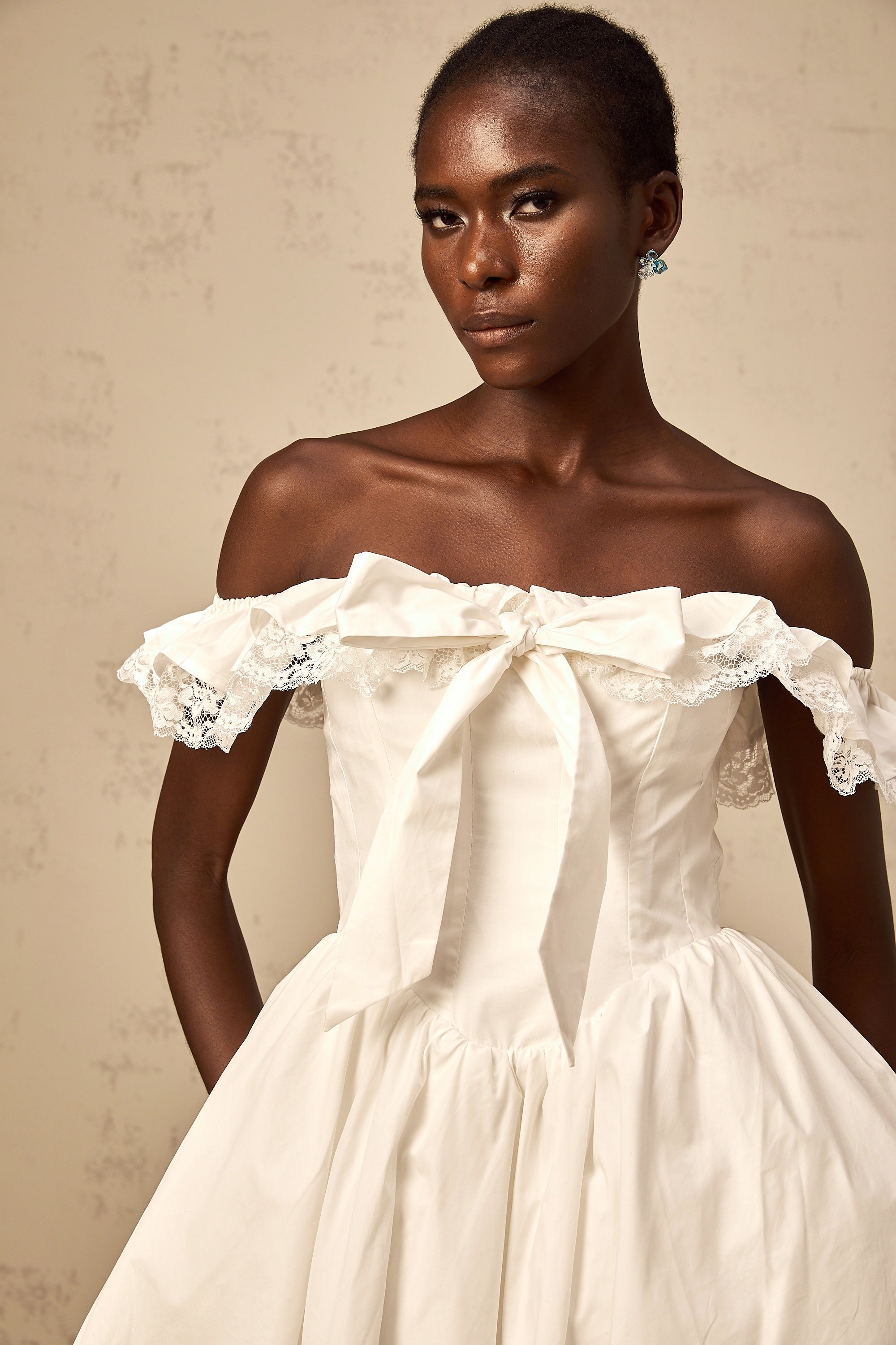 Arsène white oversize-bow ruffled mini dress