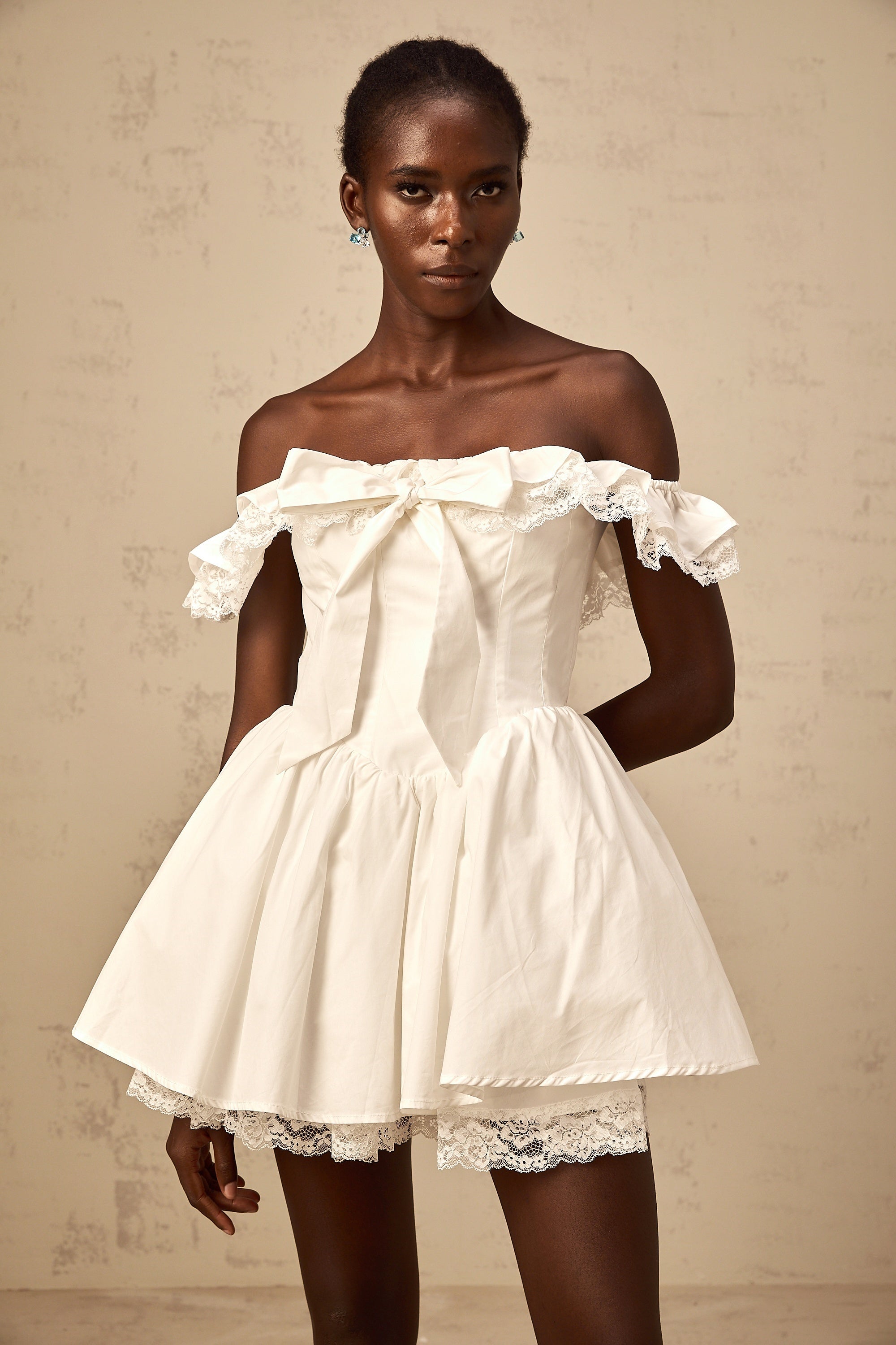 Arsène white oversize-bow ruffled mini dress