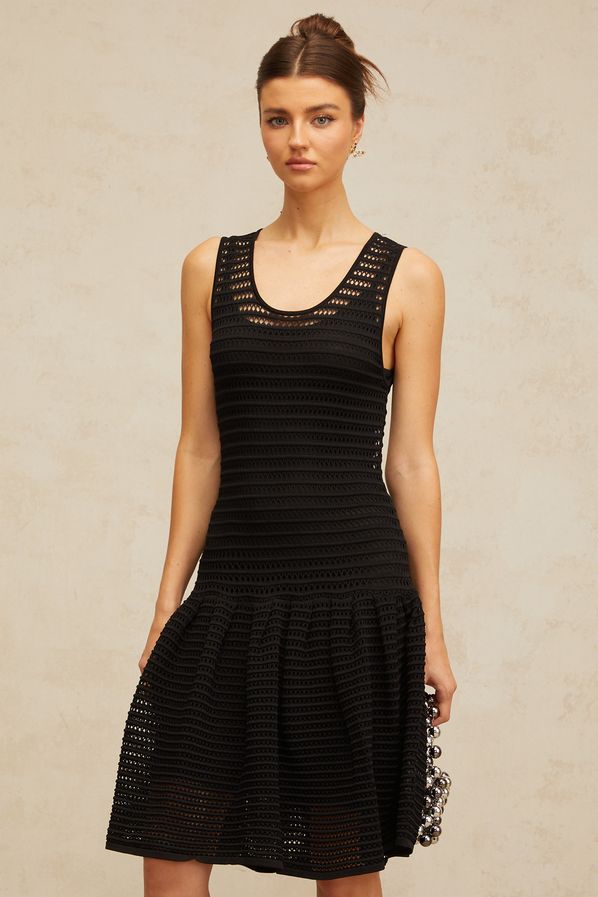 Maelle black flounced pointelle-knit mini dress