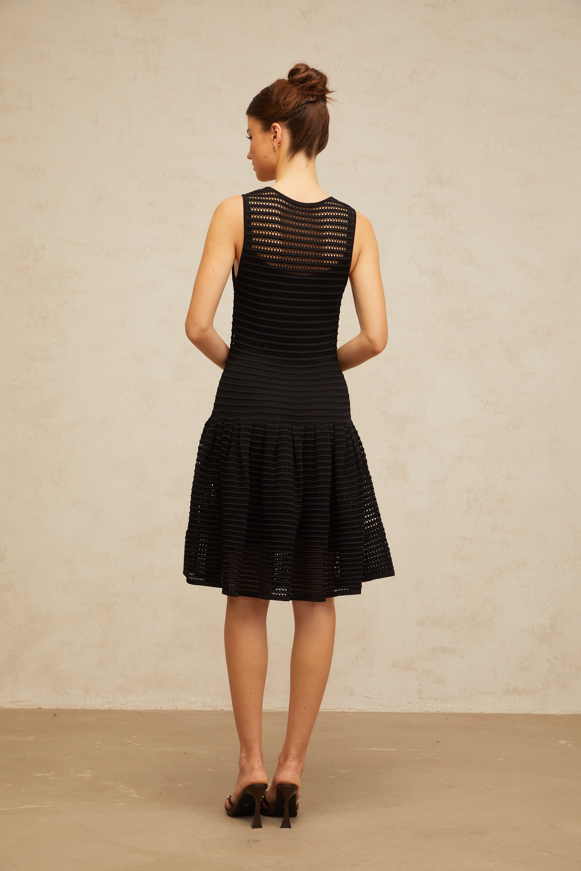 Maelle black flounced pointelle-knit mini dress