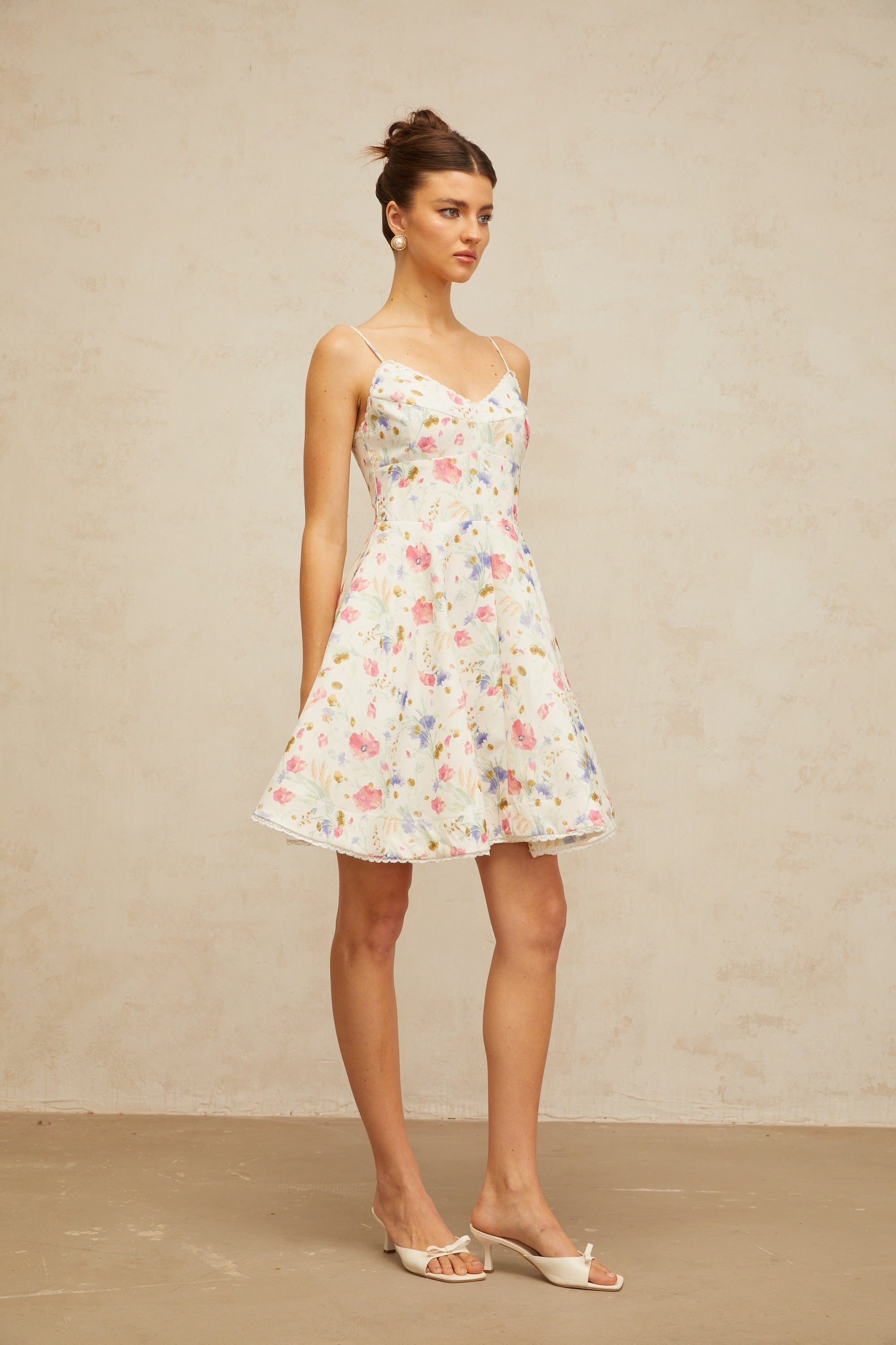 Avril floral-print flounced mini dress in White (Final Sale)