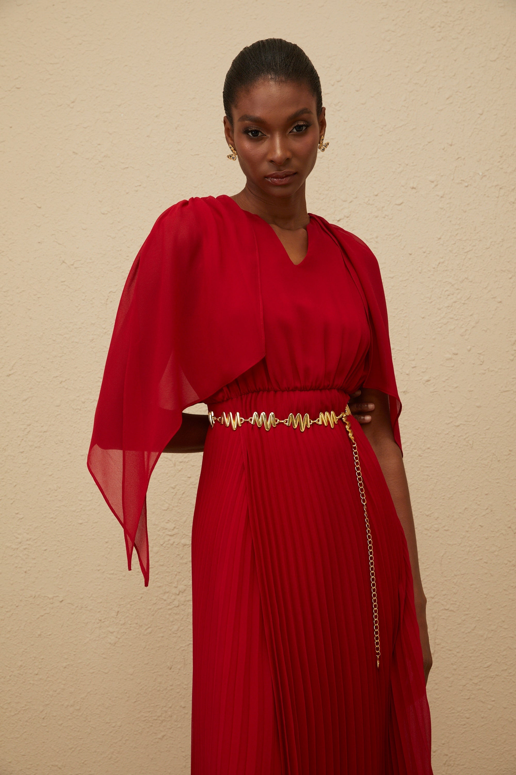 Émilie Red Pleated Maxi Dress with Cape Detail