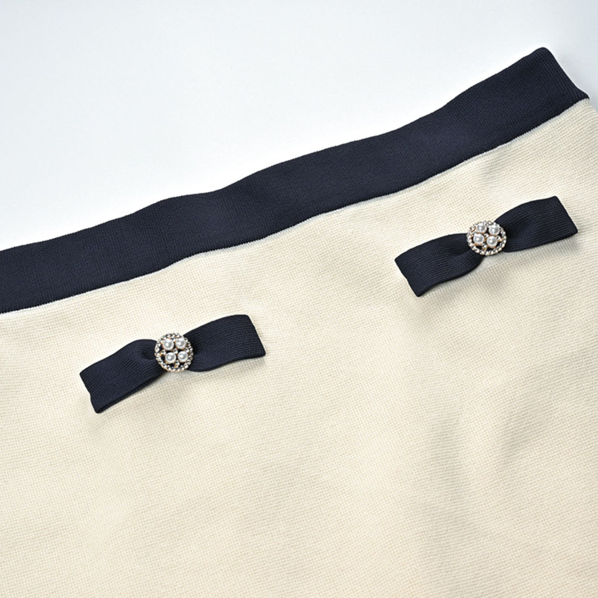 Émeline bow-detail knitted cardigan & skirt matching set