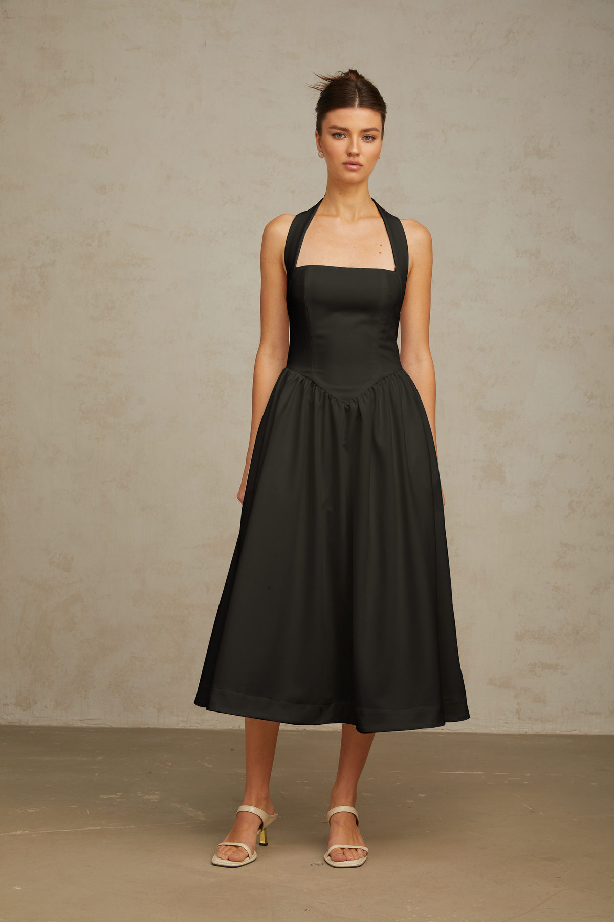 Alizée halterneck pleated midi dress in Black