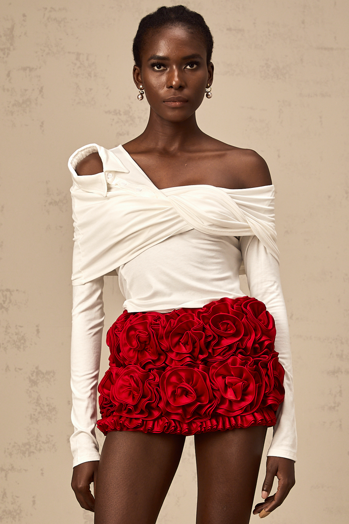 Zoéline white asymmetrical twisted jersey top