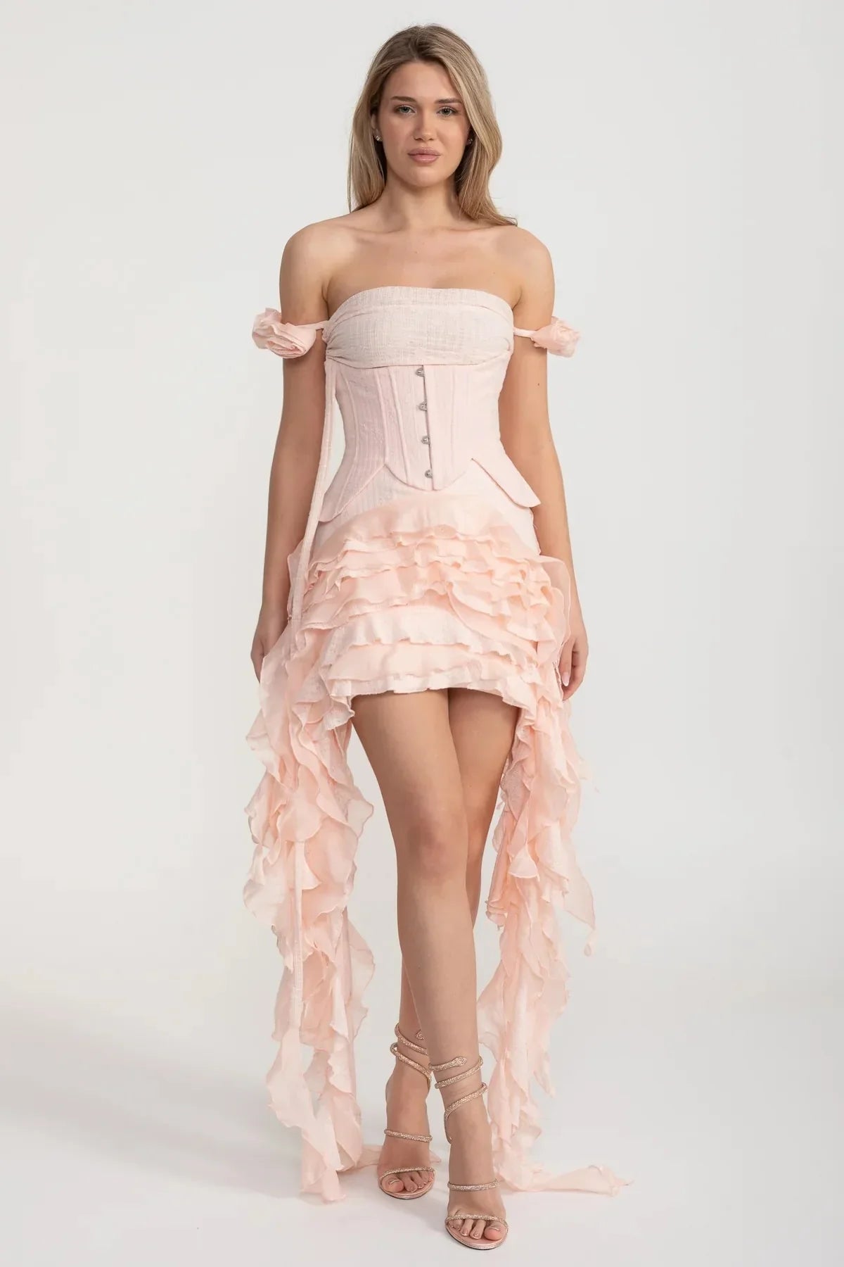 Vintage Inspired Corset Dress With Ruched Bustier And Flowing Ruffled Side Details - Pink