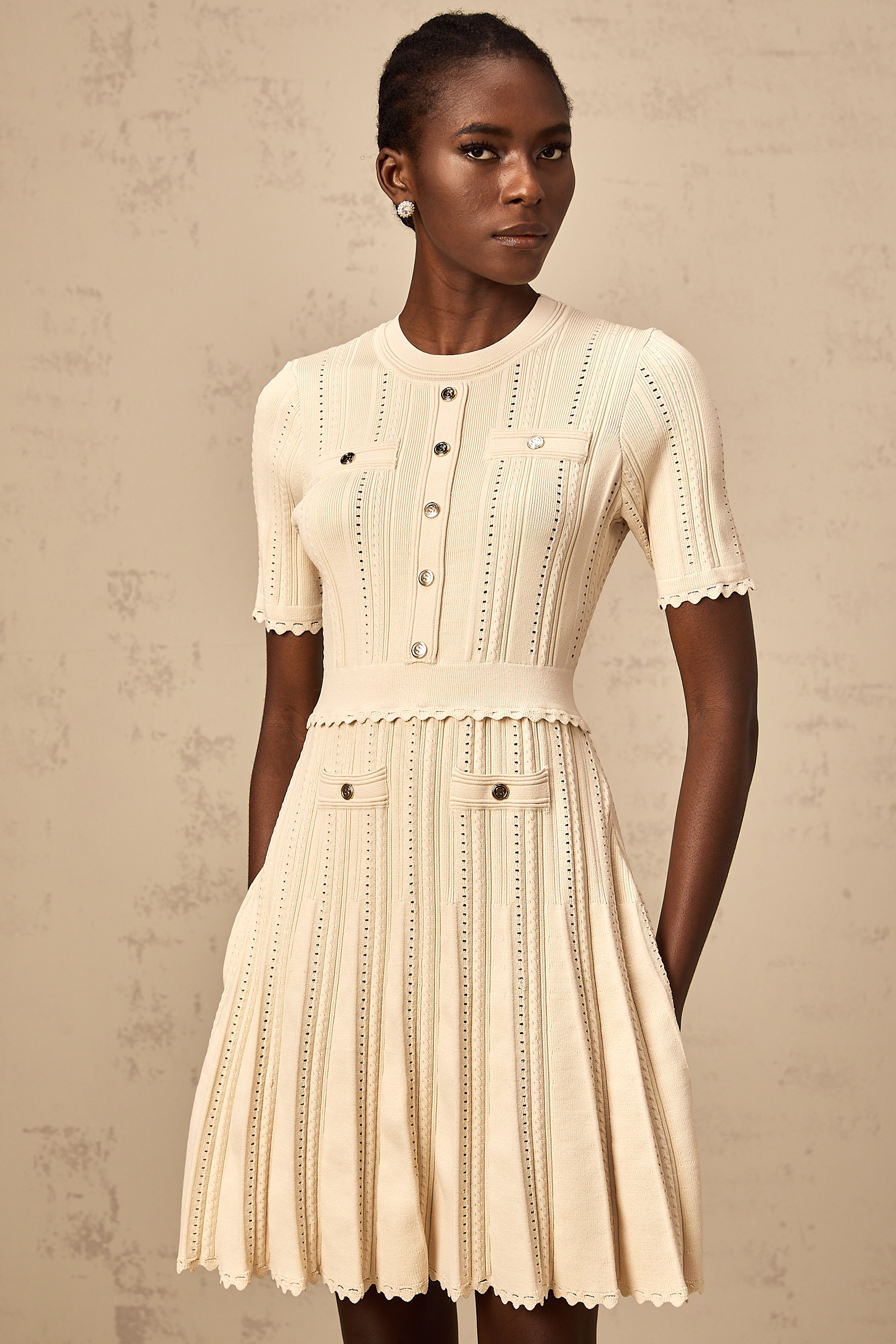 Amélie neutrals pointelle-trim pleated knit mini dress (Final Sale-US Only)