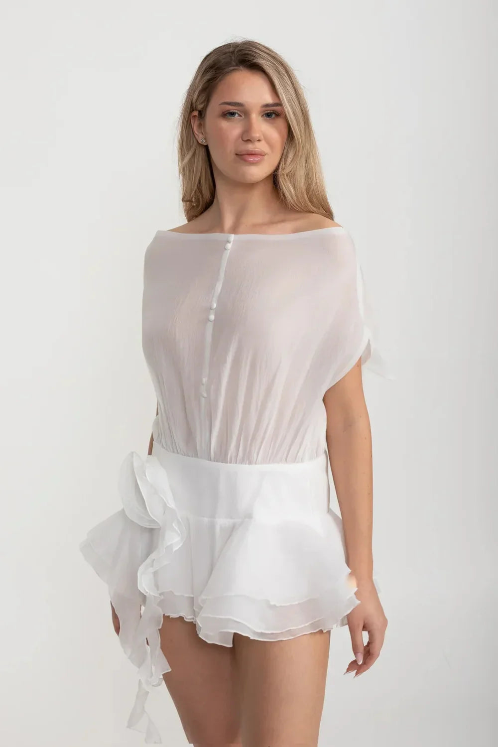 Elegant Mini Dress With Peplum Hem And Rosette Waist Embellishment - White