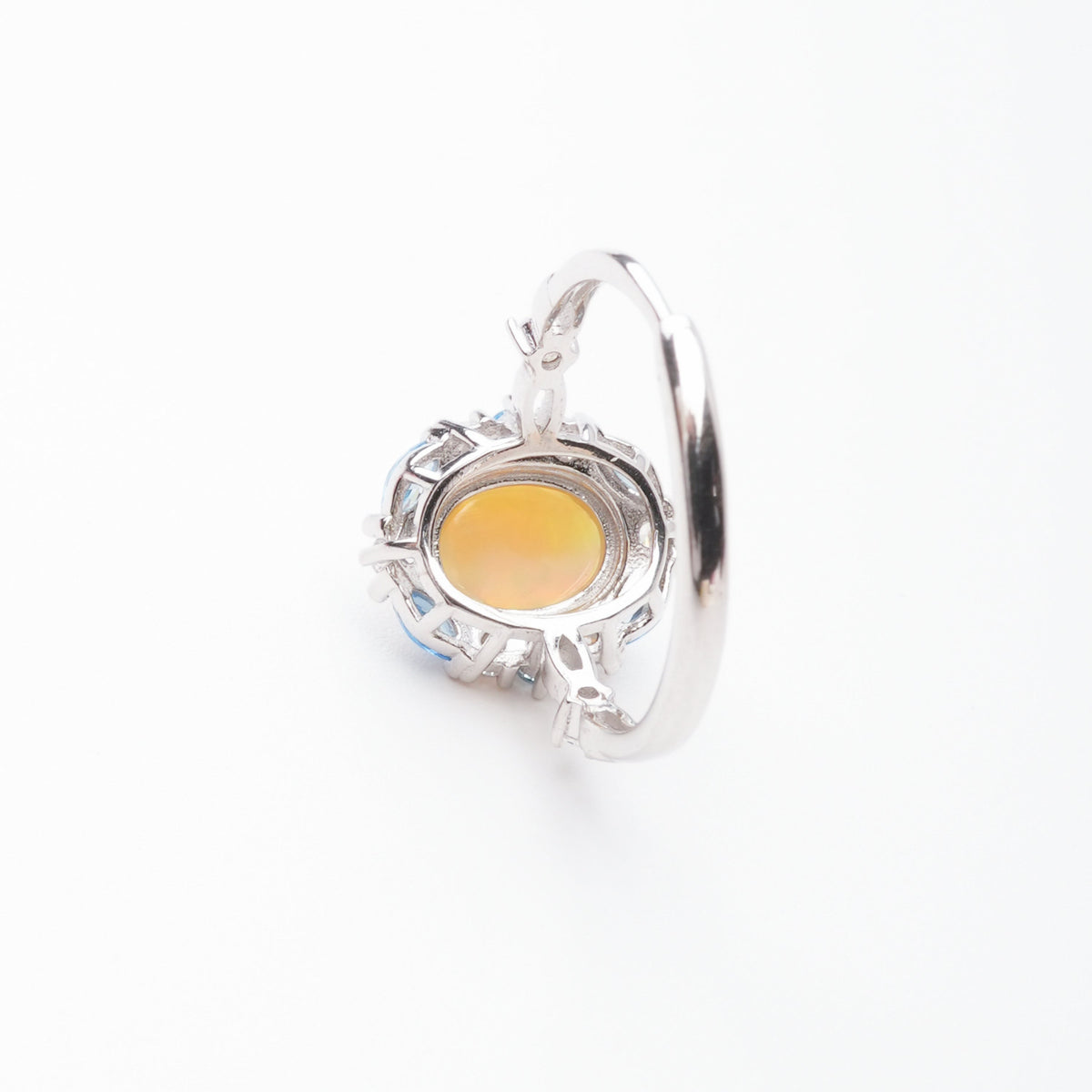 Christine Yellow Opal Oval Cabochon Blue Halo Sterling Silver Ring