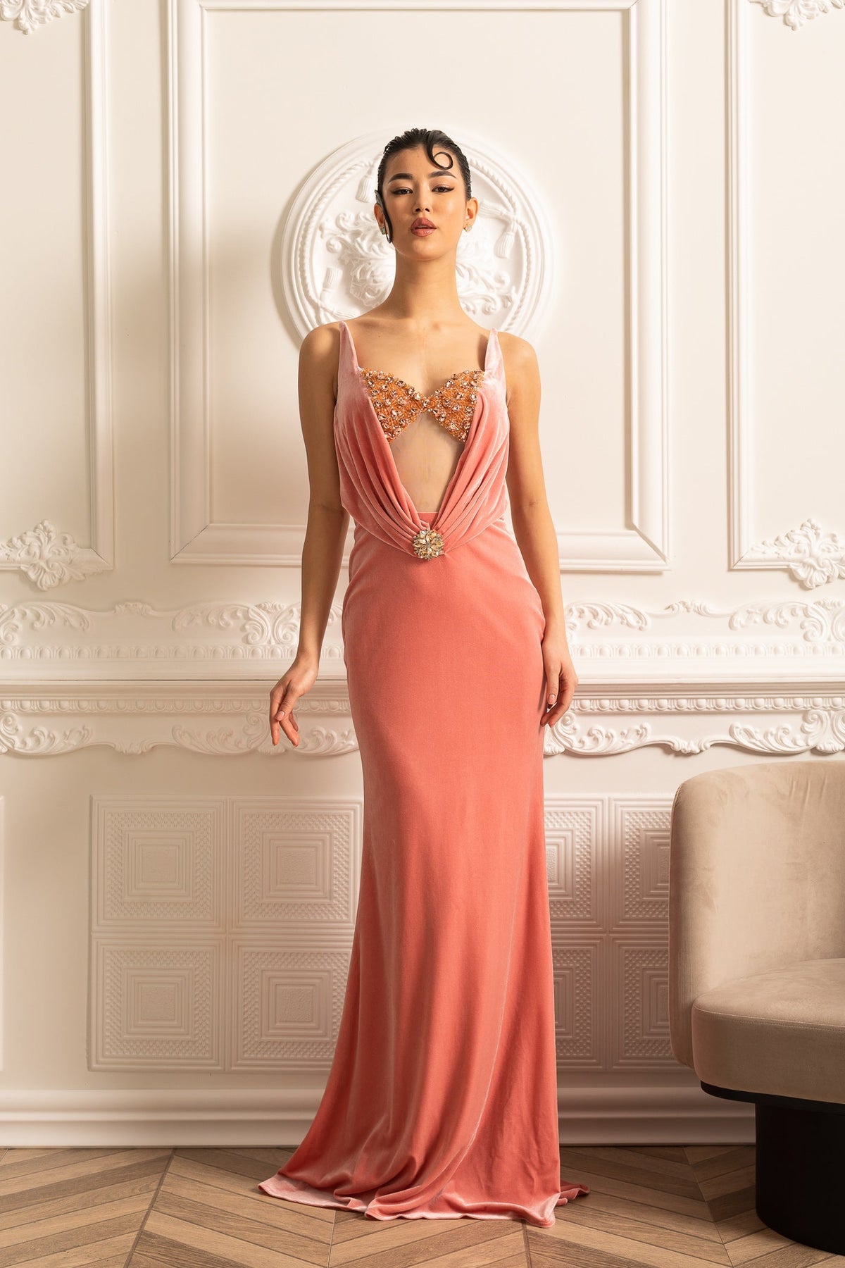Elegant Gown With Deep Neckline And Decorative Brooch Accent - Peach