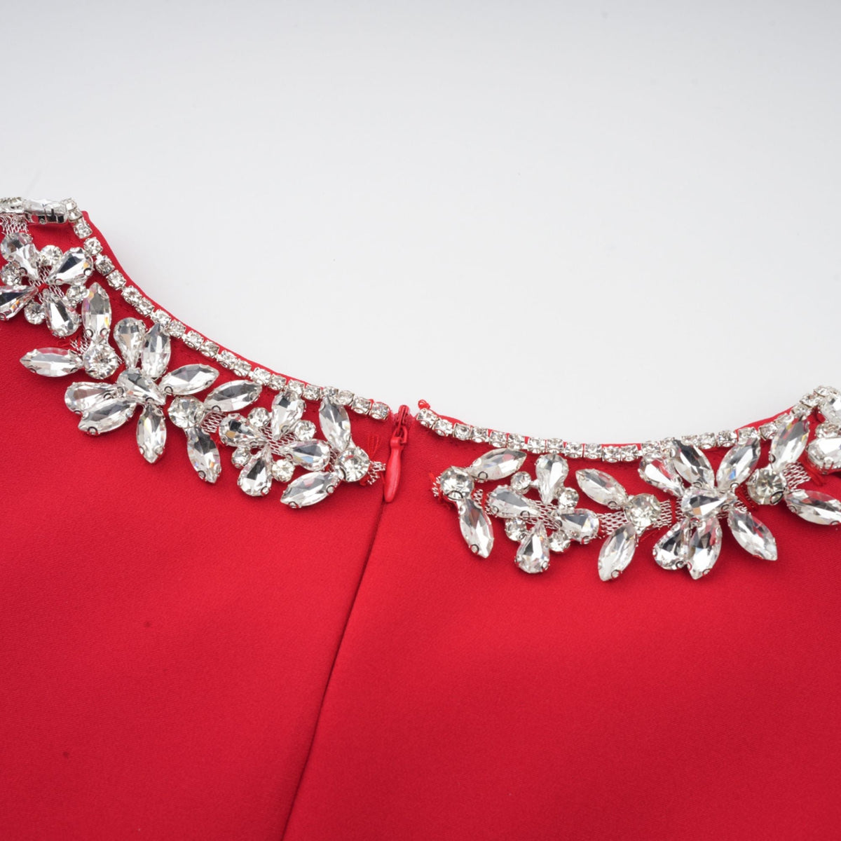 Léonie red embellished pleated mini dress