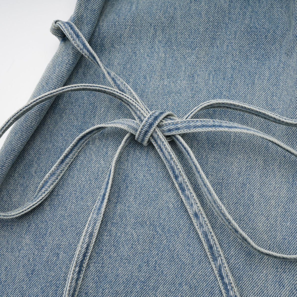 géraldine strap-detail jeans