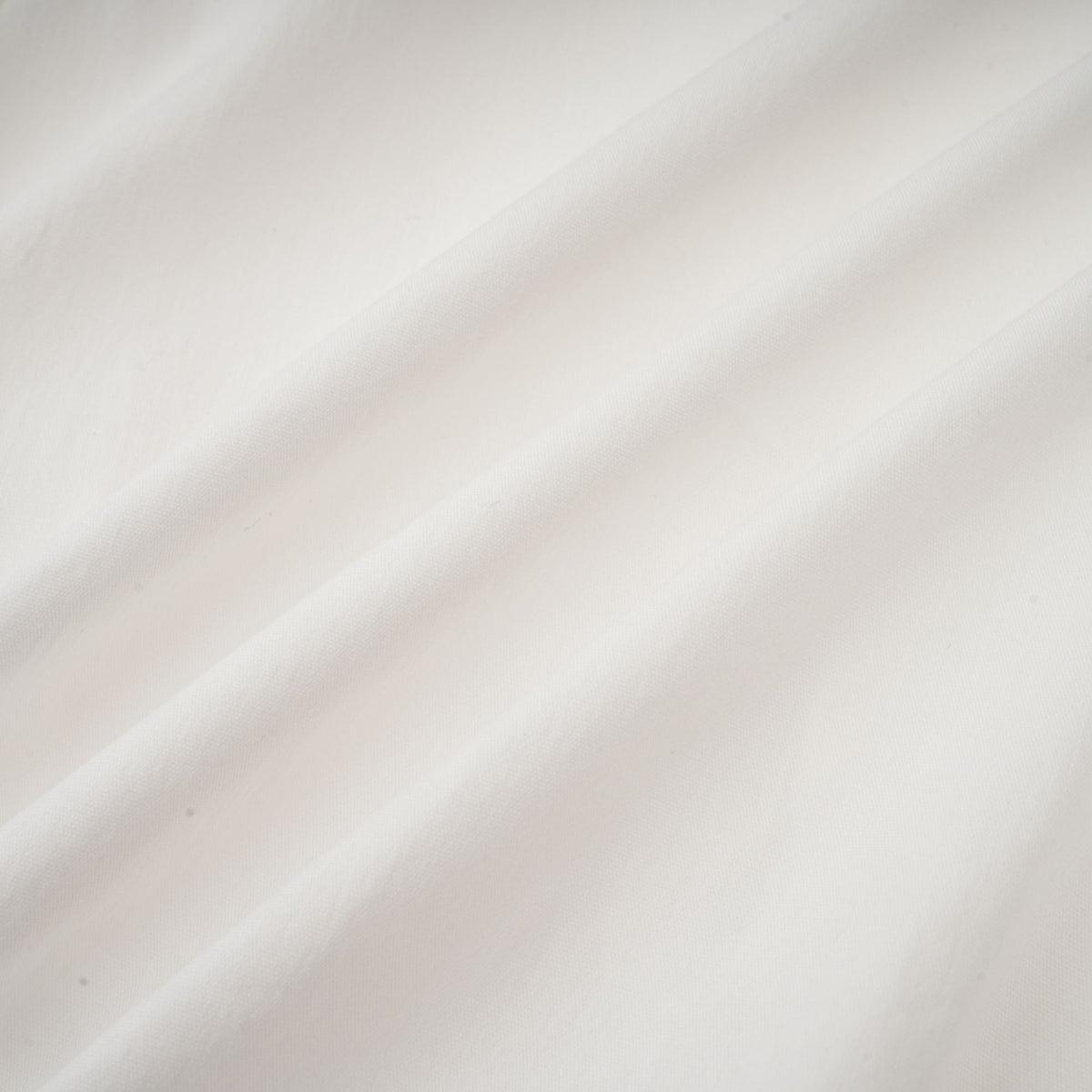 Céleste white pleated scarf-collar shirt