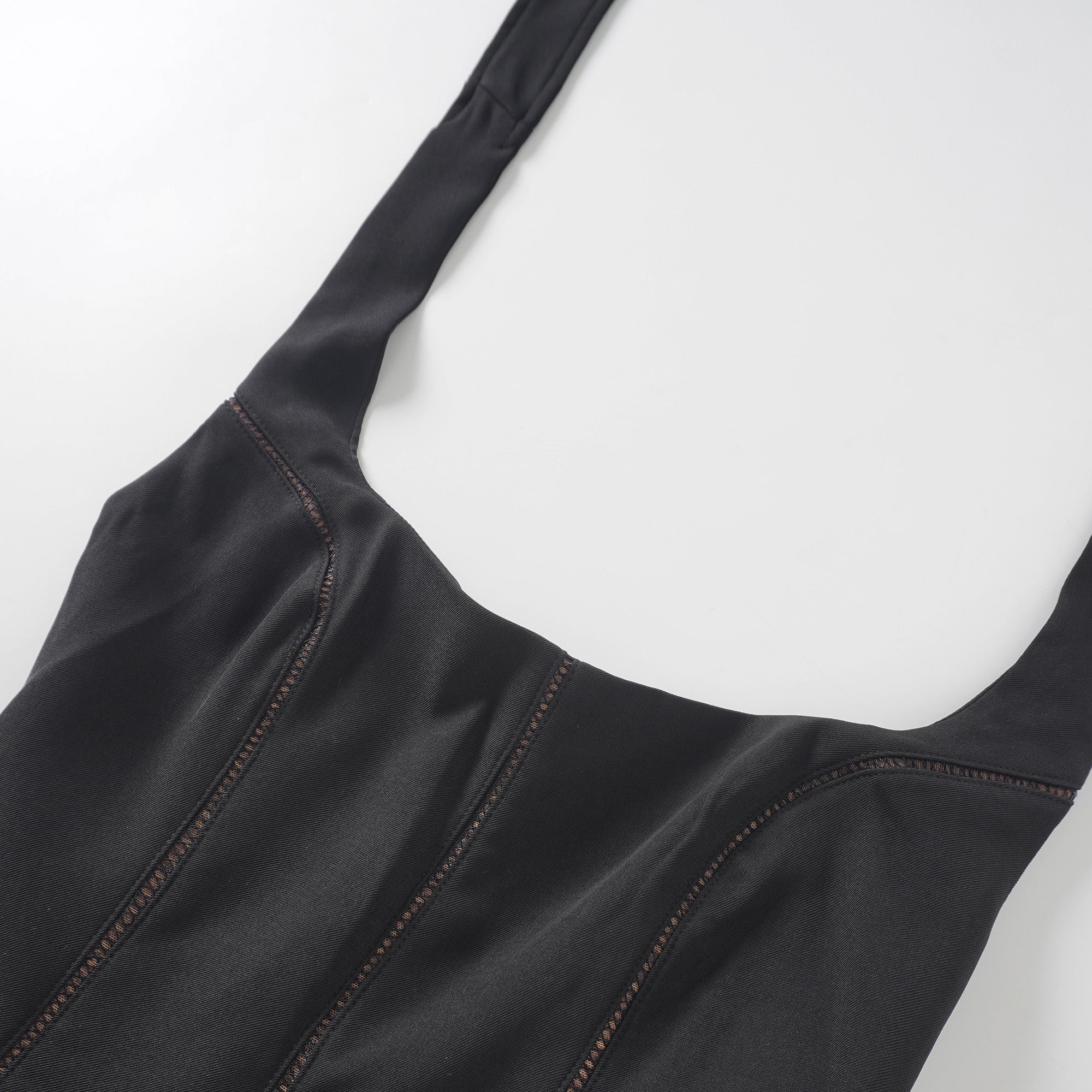 Quirine halterneck bow-detail mini dress in Black