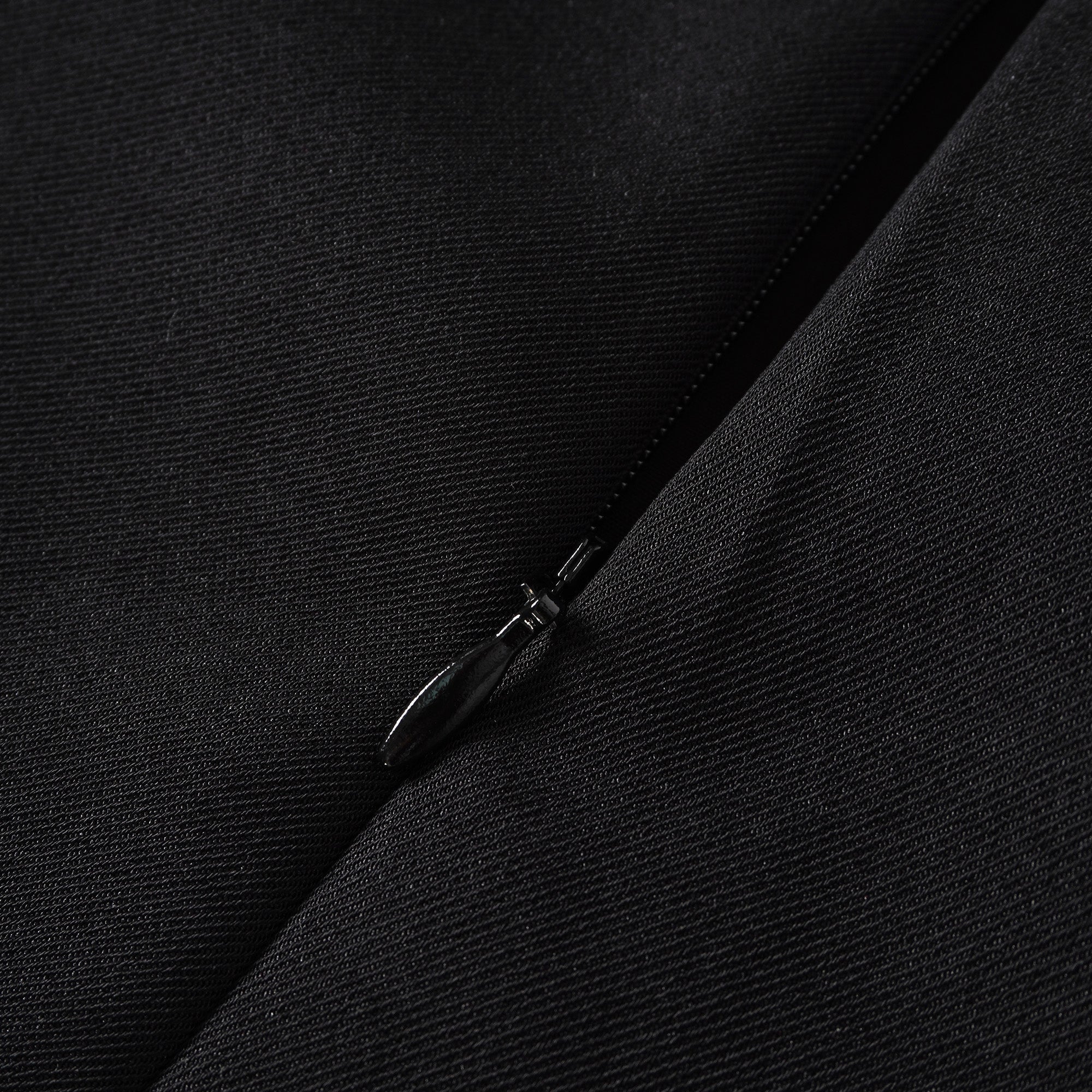 Quirine halterneck bow-detail mini dress in Black