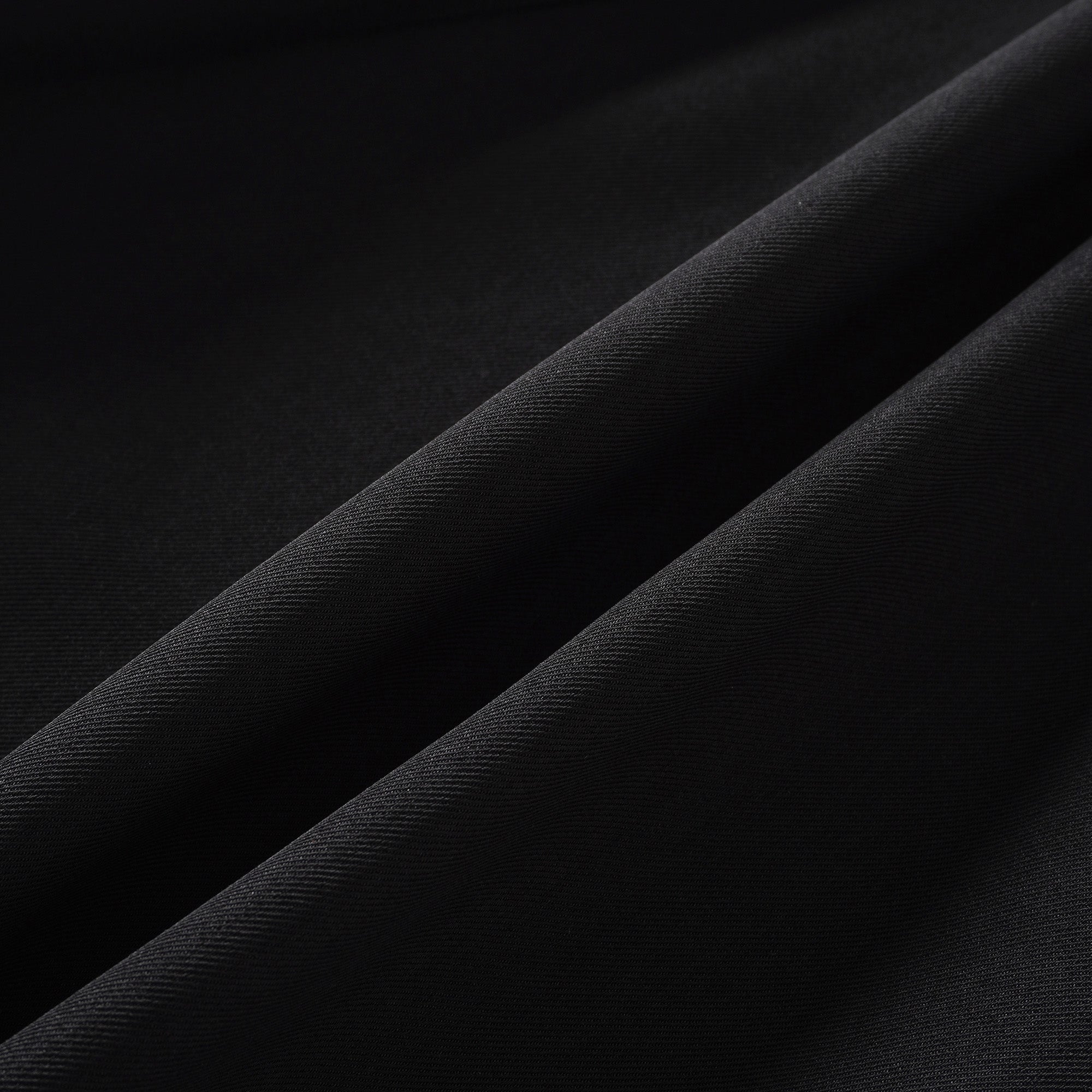 Quirine halterneck bow-detail mini dress in Black