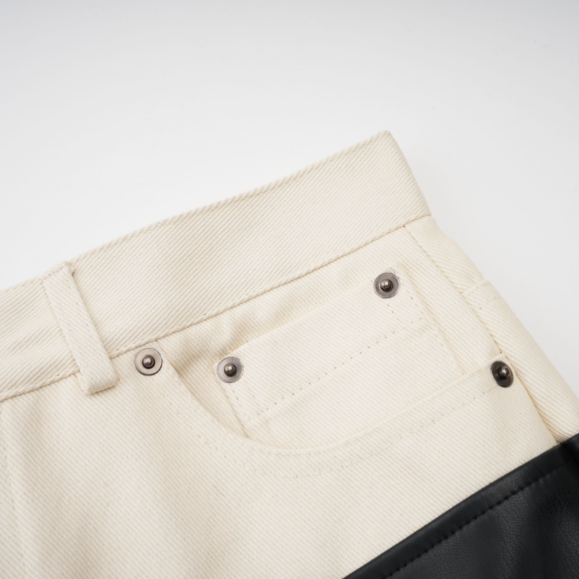 Clotilde contrast-color leather trousers