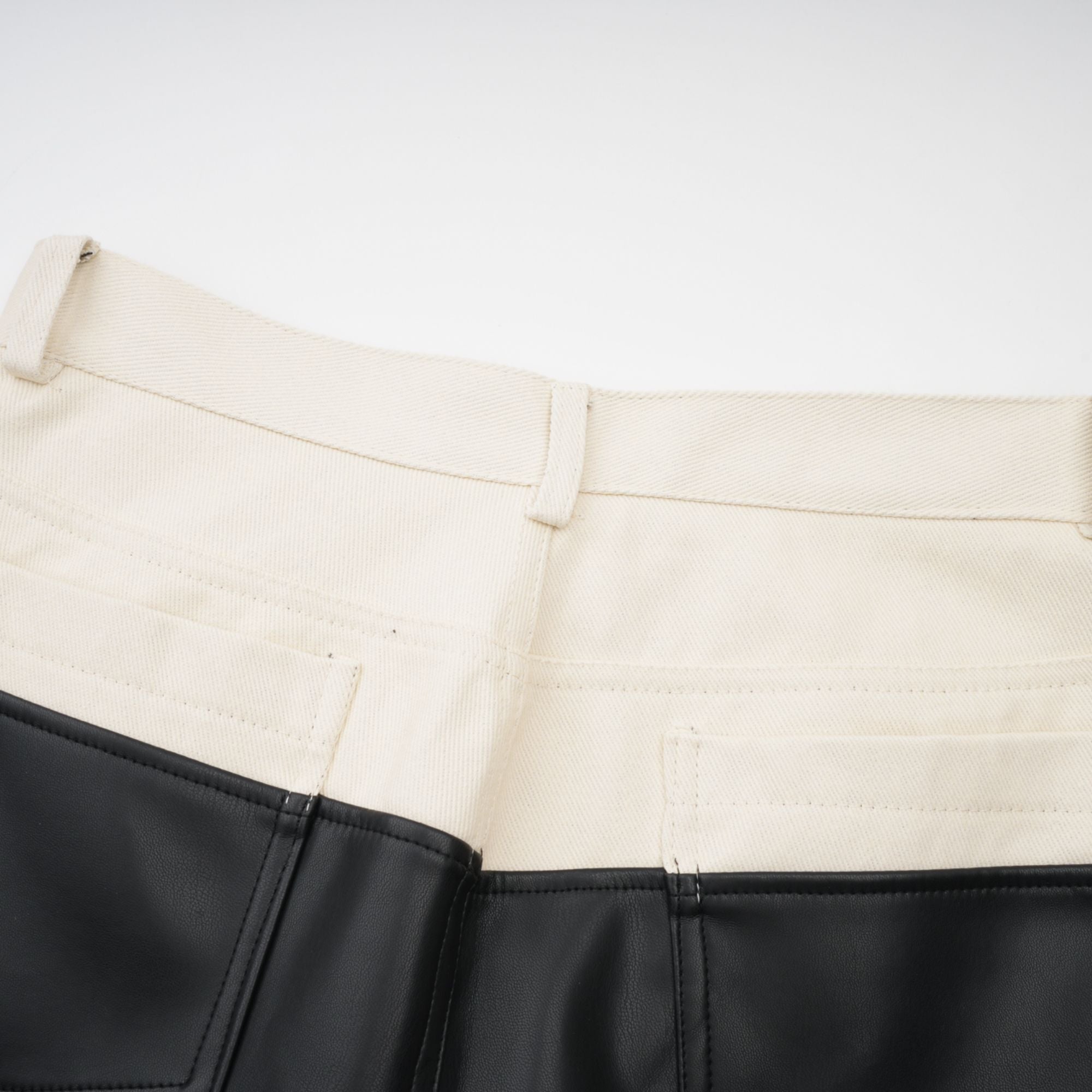 Clotilde contrast-color leather trousers