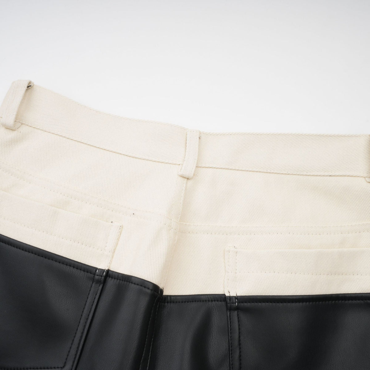 Clotilde contrast-color leather trousers