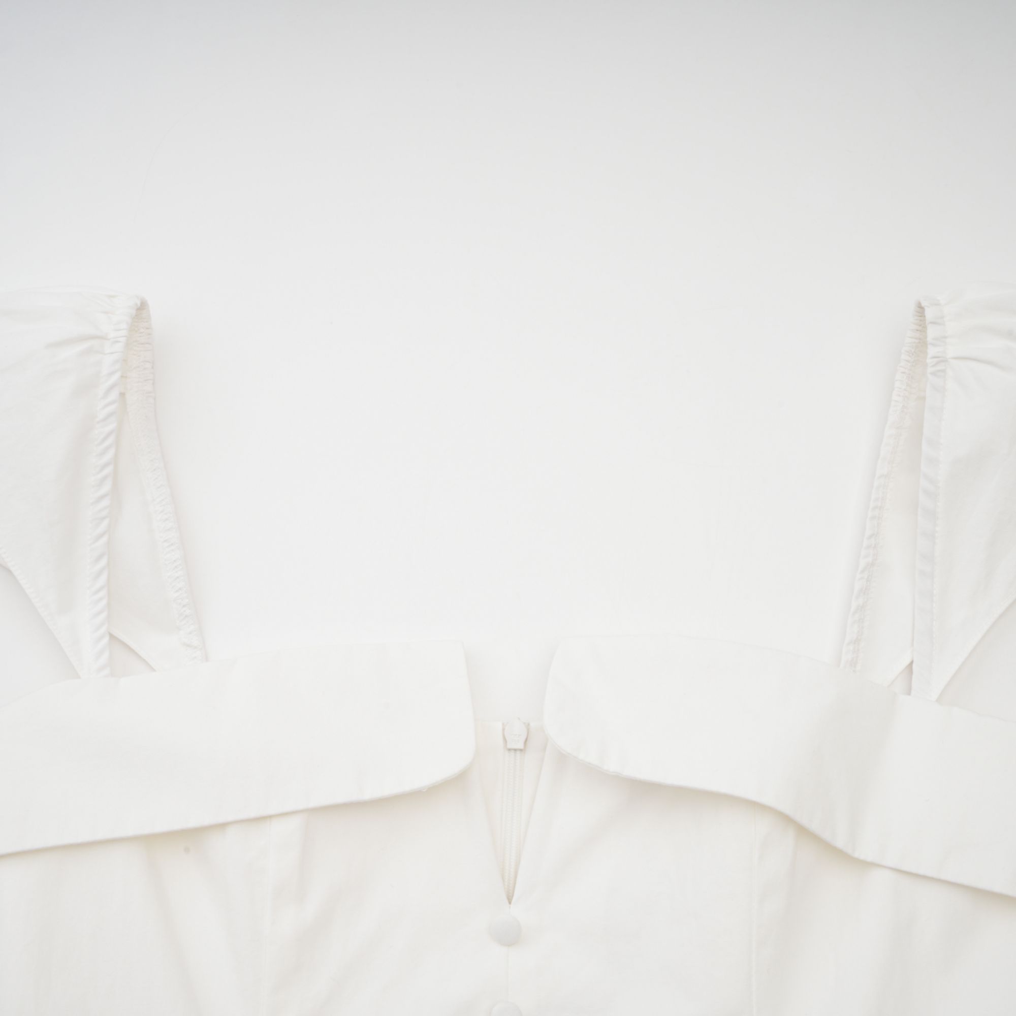 Julie white folded-neck bonded sleeveless mini dress