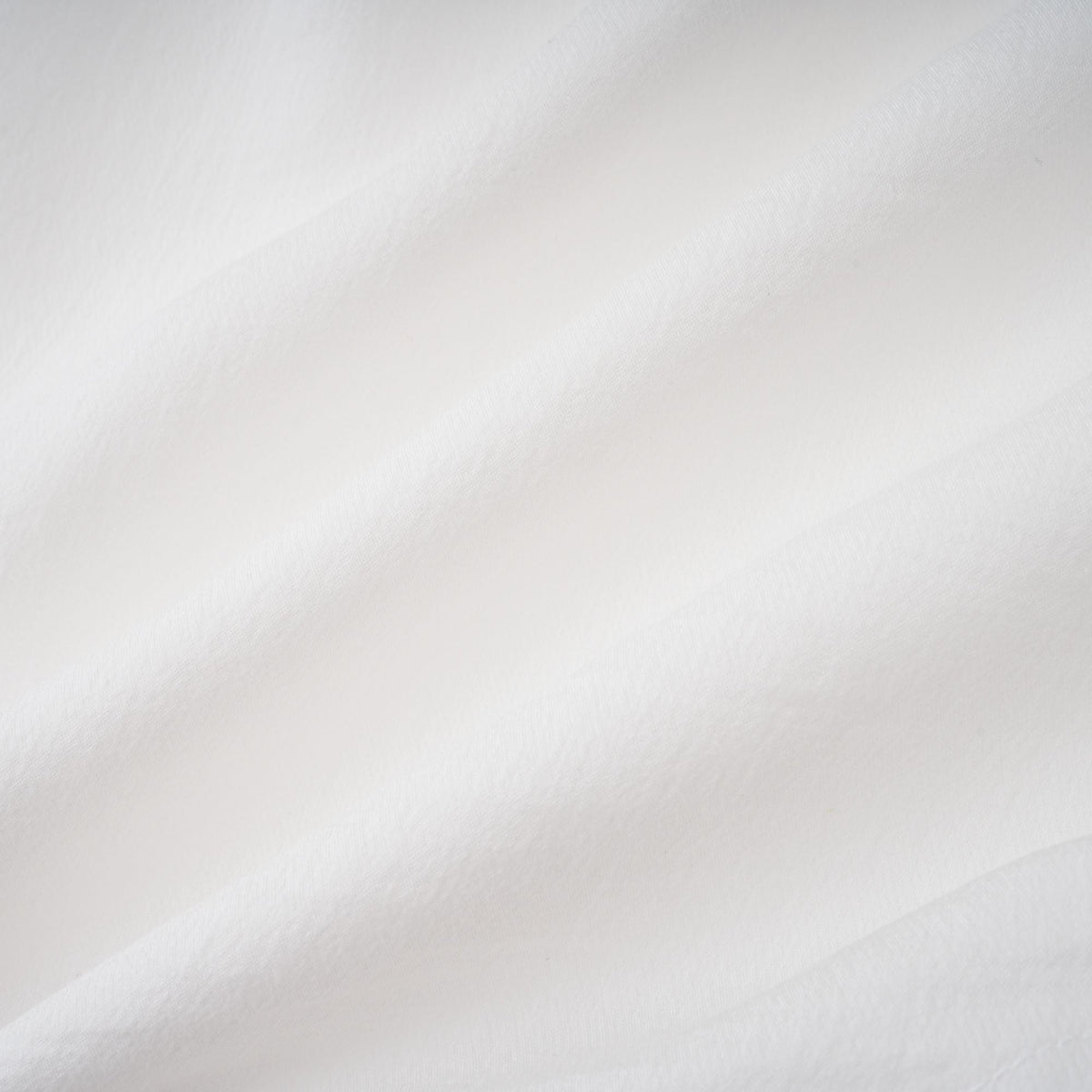 Quincie white shirred flounced mini dress