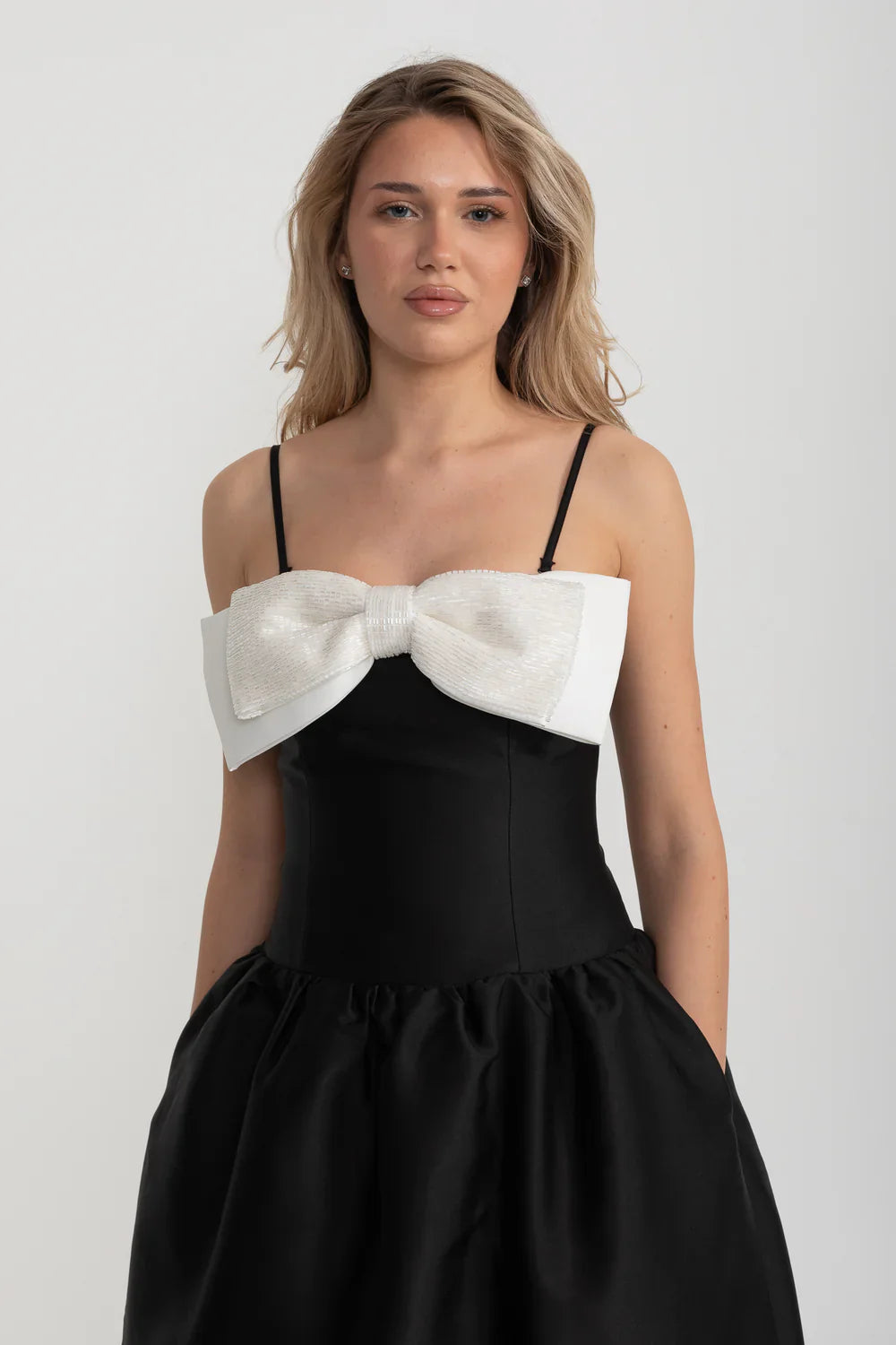 Fitted Sleeveless Mini Dress With Prominent Large White Bow - Black