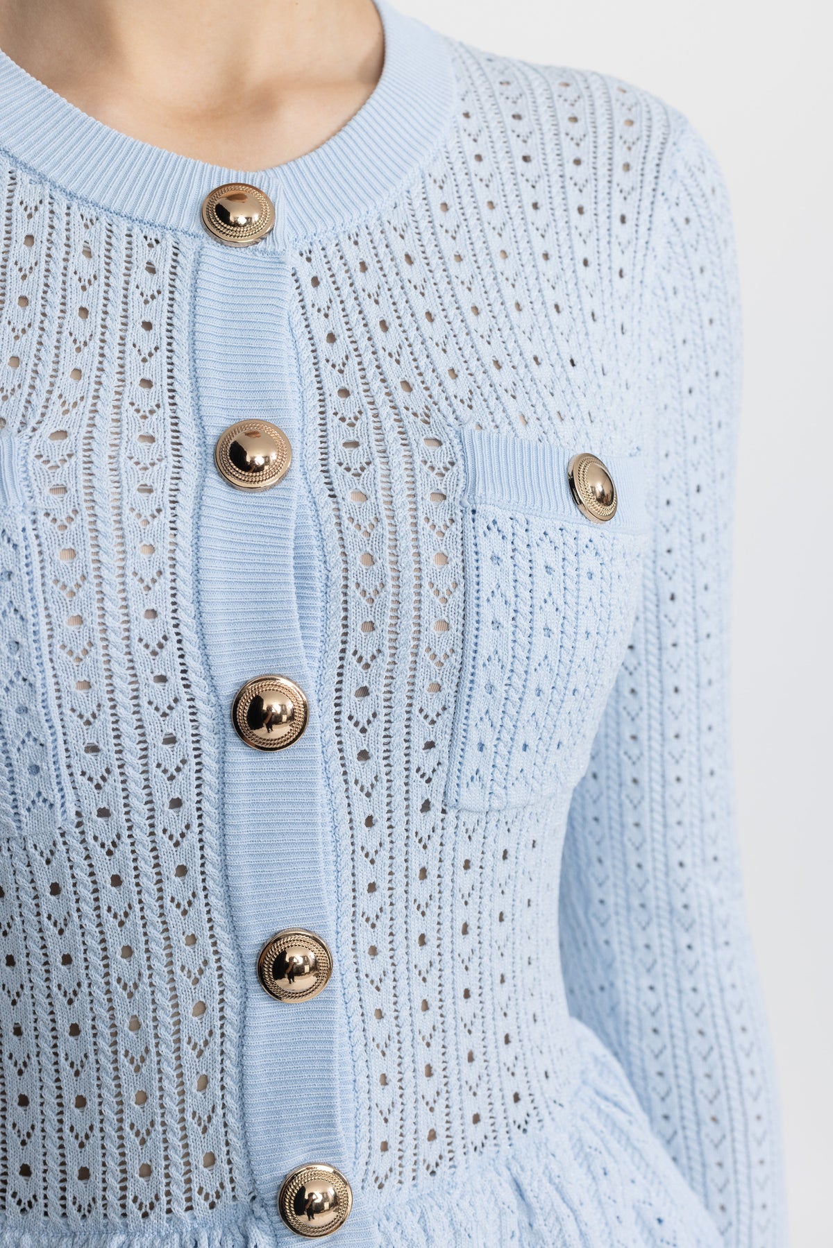 Henriette Light Blue Pointelle Knit Peplum Mini Dress with Gold Buttons