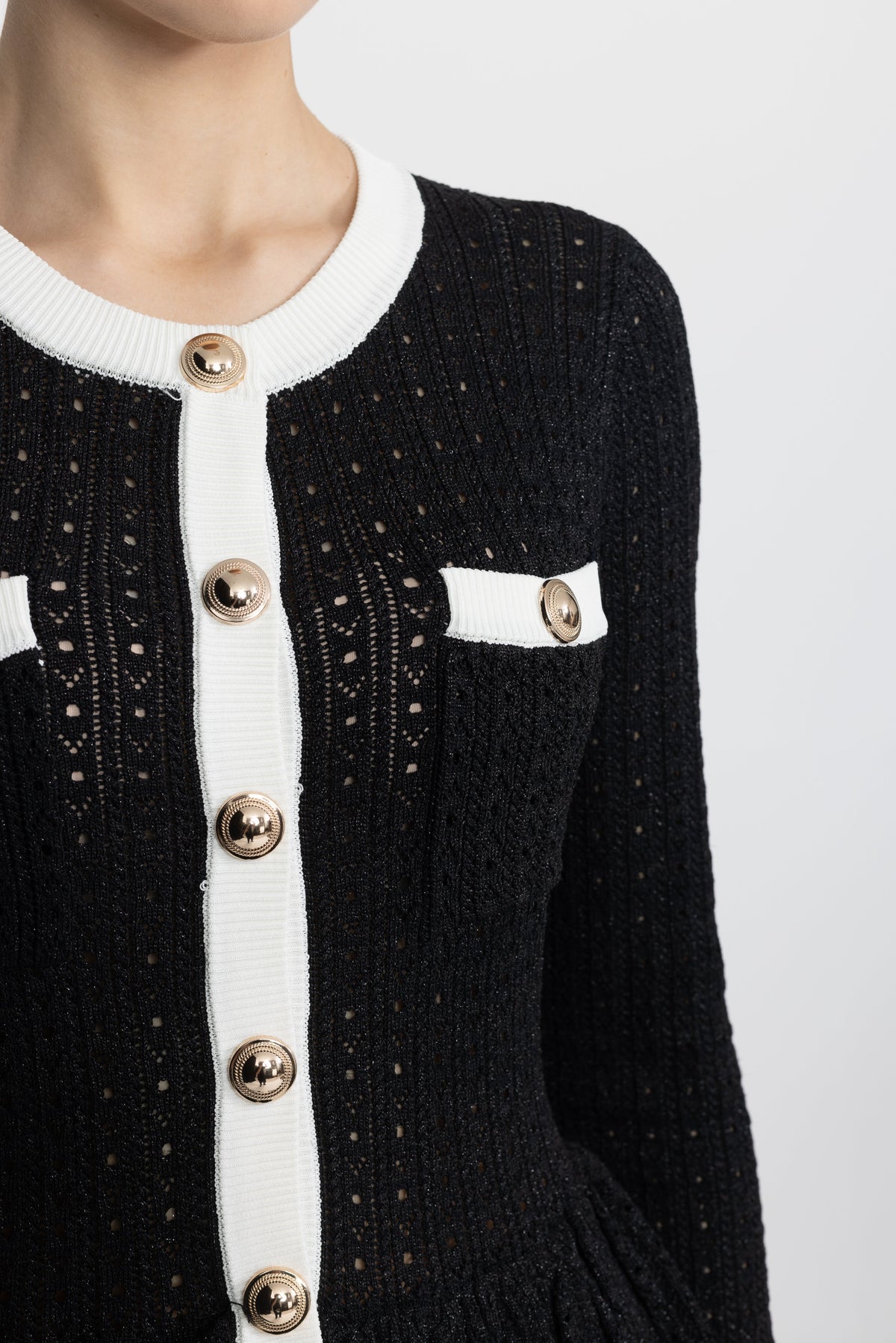Henriette Black Pointelle Knit Peplum Mini Dress with Gold Buttons