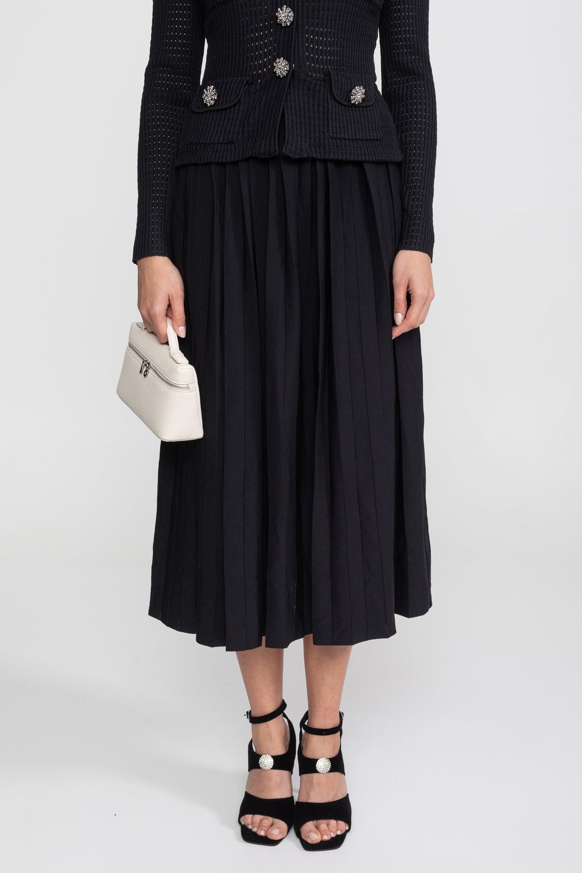 Isolde Black Open-Knit Dress with Pleated Midi Skirt