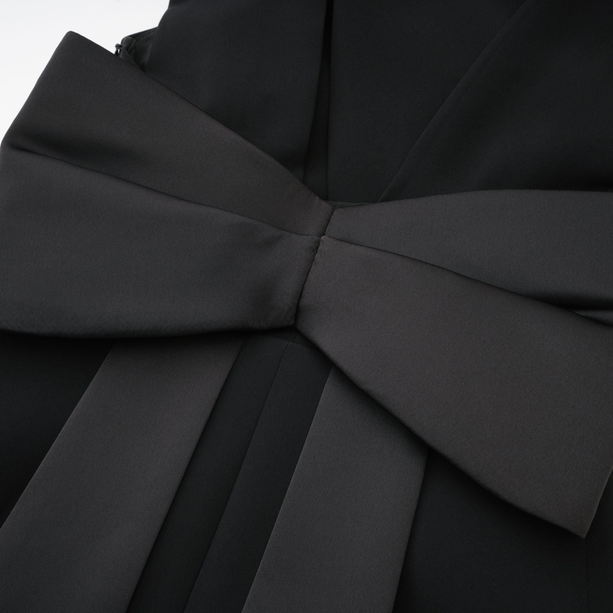 Noémie black oversize-bow mini dress (US Only)