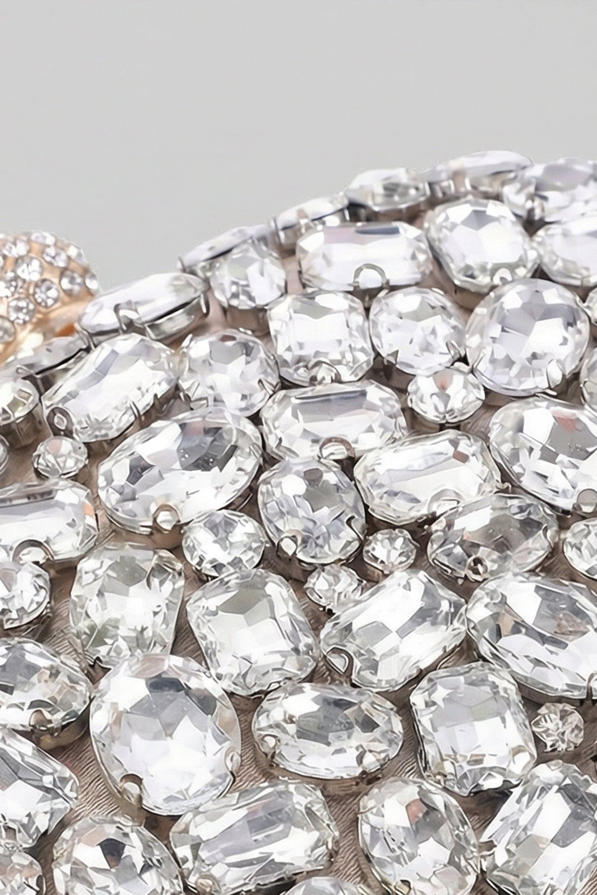 Crystal-Embellished Oval Clutch with All-Over Stone Finish – Silver
