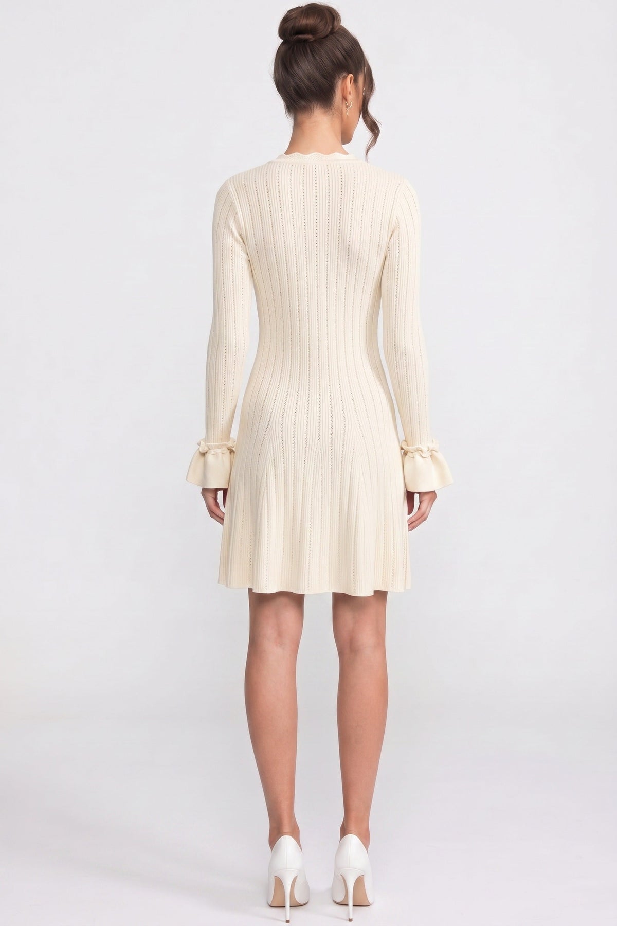 Henriette Ivoire Long-Sleeve V-Neck Knit Mini Dress With Ruffle Hem And Bow Cuffs