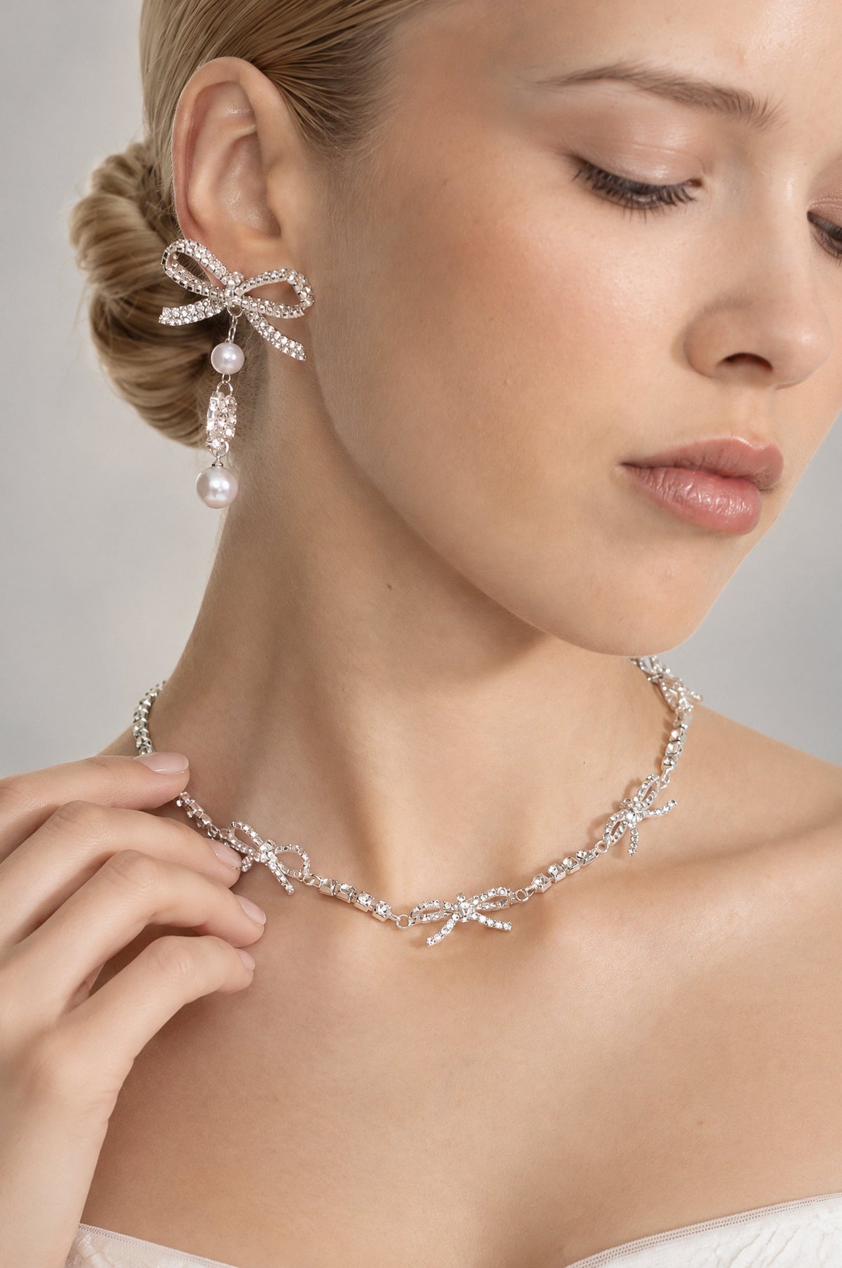 Arlette Silver Crystal Bow Necklace and Pearl Drop Earrings Set