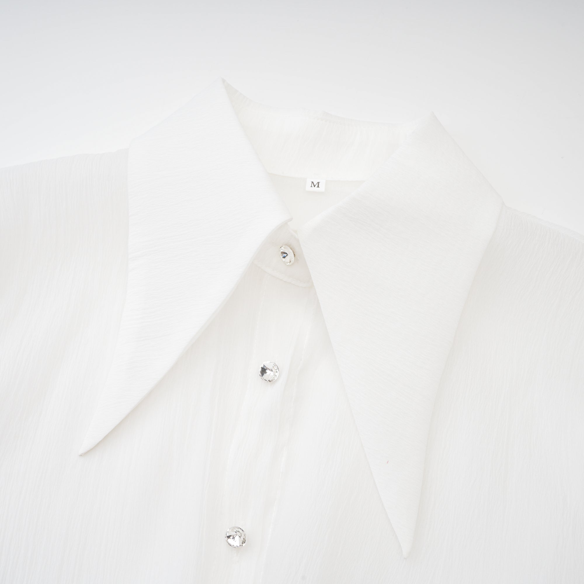 Renée white ruffled mini shirt dress