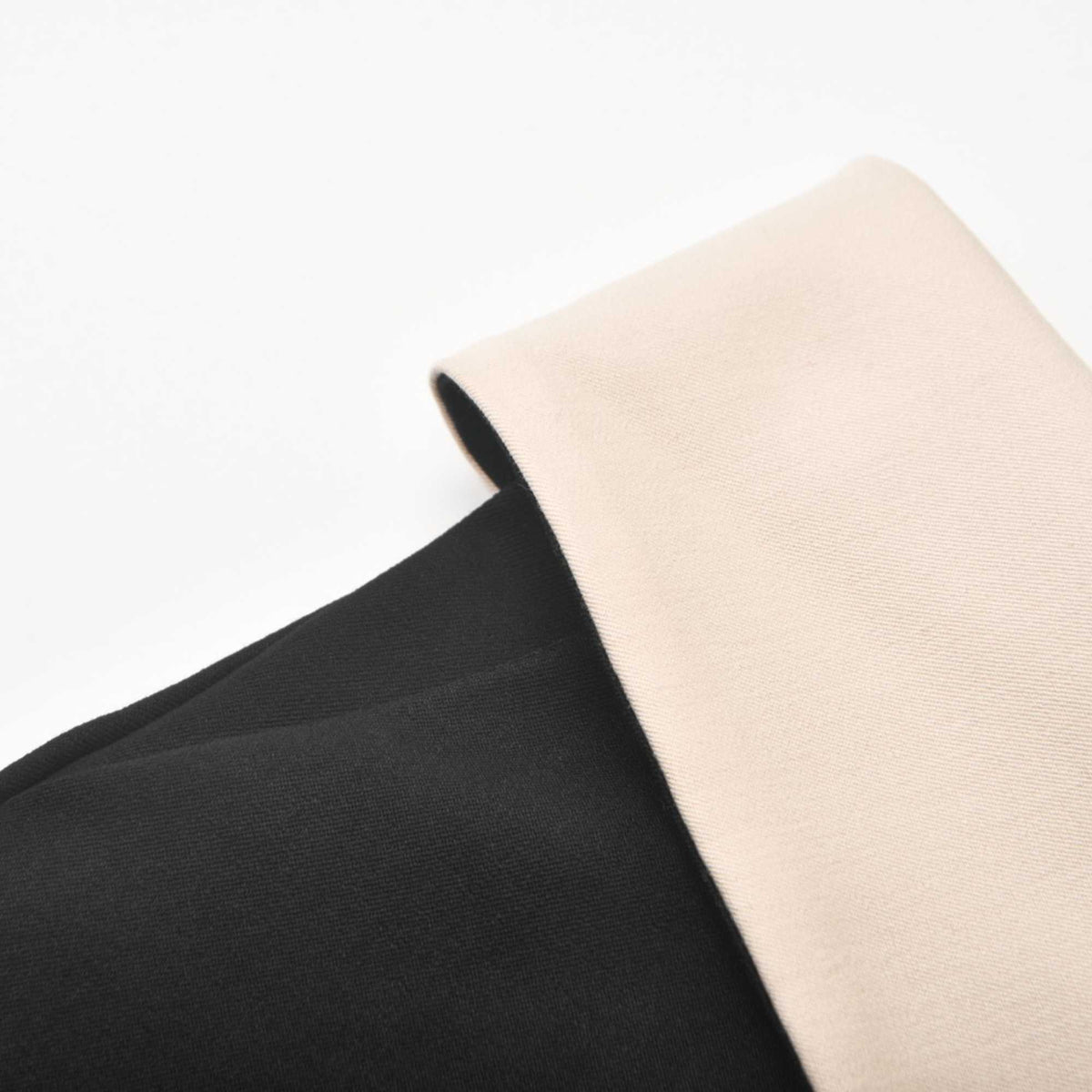 Naomi inside-out contrast-color trousers