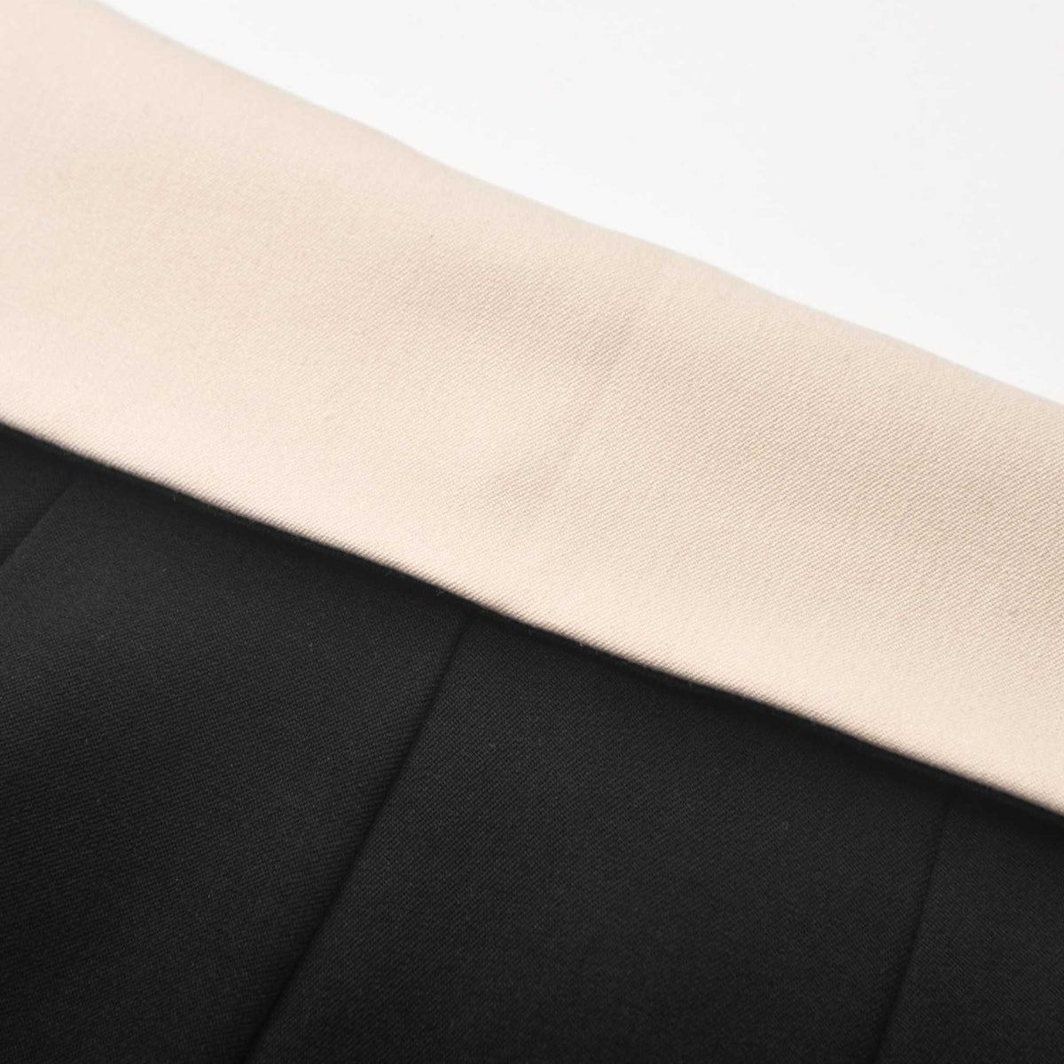 Naomi inside-out contrast-color trousers