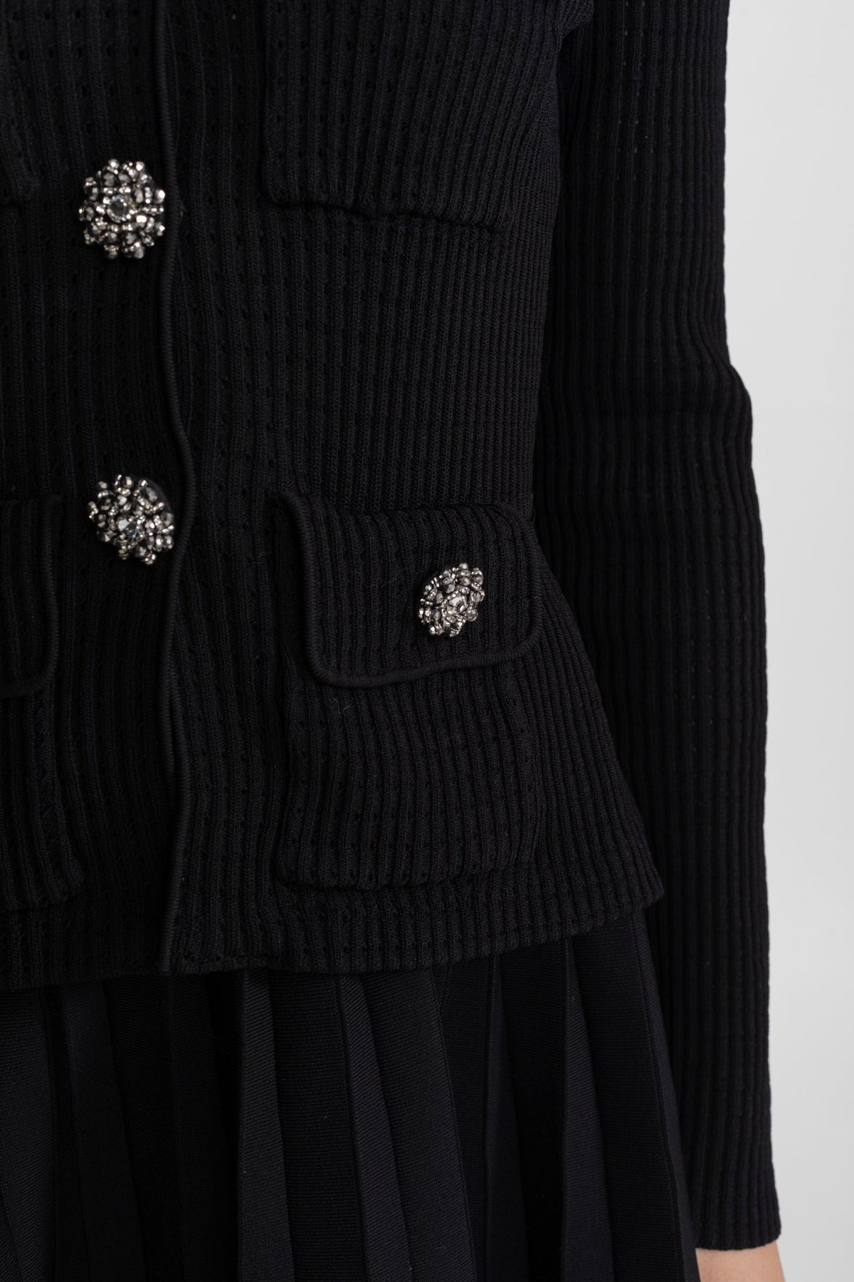 Paulette Black Ribbed Knit Mini Dress with Contrast Collar and Pleated Skirt
