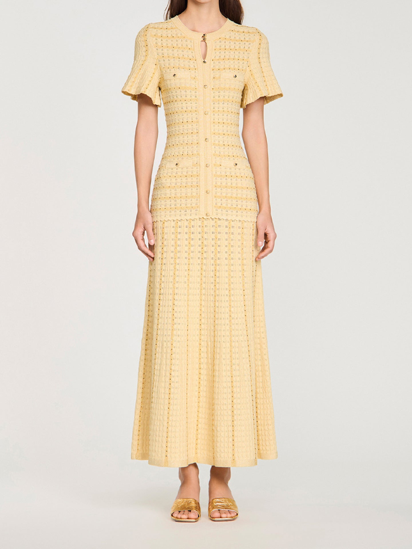 Sandro Victoire Rhinestone Knit Maxi Dress in - Gold